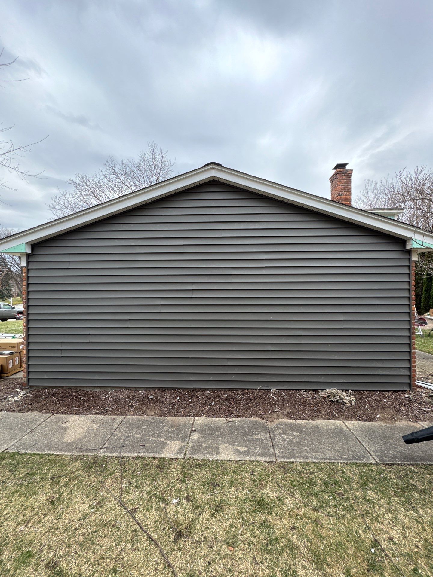 Siding Replacement using Alside Charcoal Smoke and Roof Replacement using Owens Corning Peppercorn by 180 Contractors