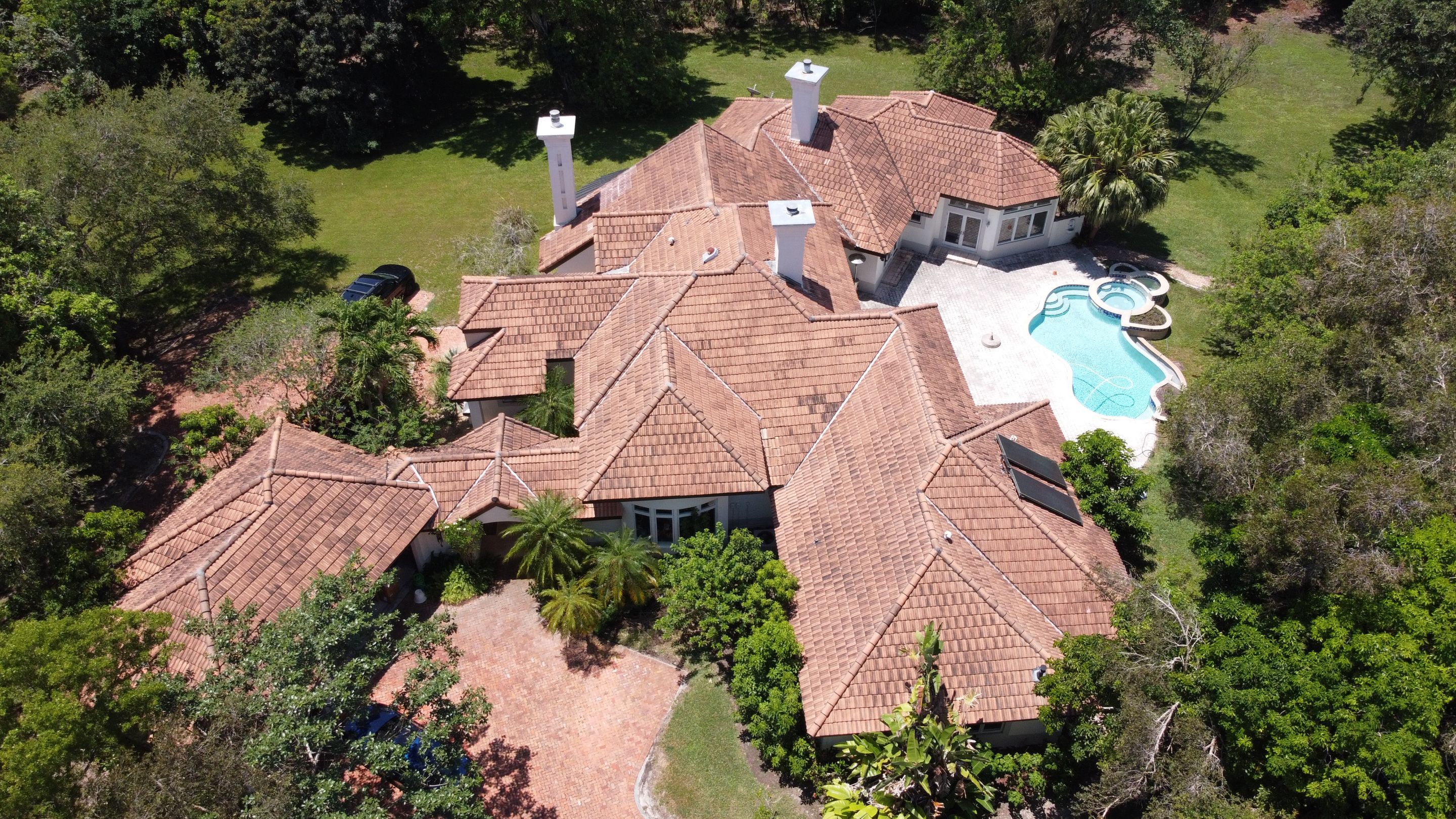 Residential Roofing Installation using 1" Nail strip metal roof by BLUES BROTHERS CONSTRUCTION CORP