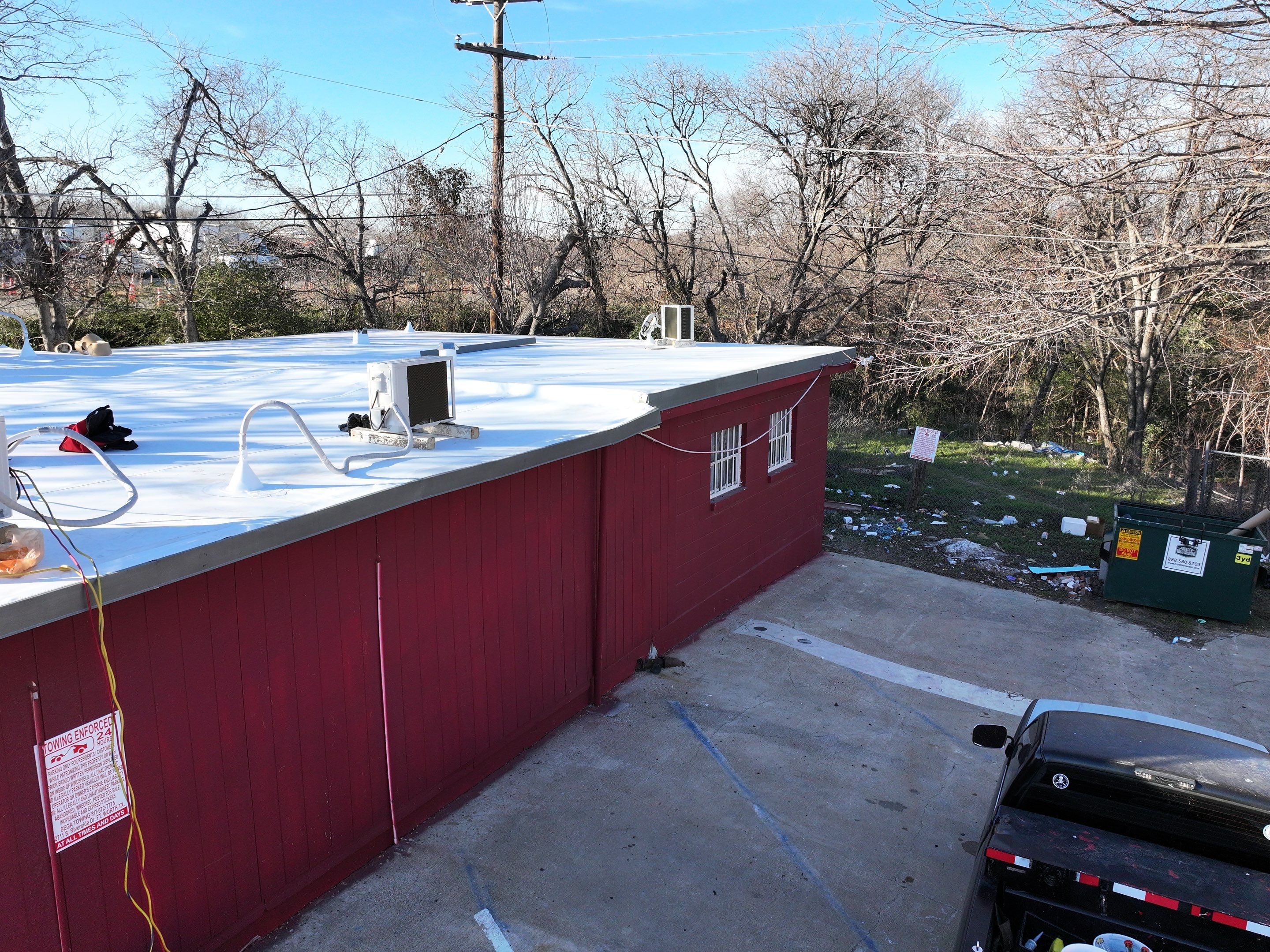 Commercial roofing overlay using GAF TPO over an old ballast roof by Becker Roofing and Exteriors