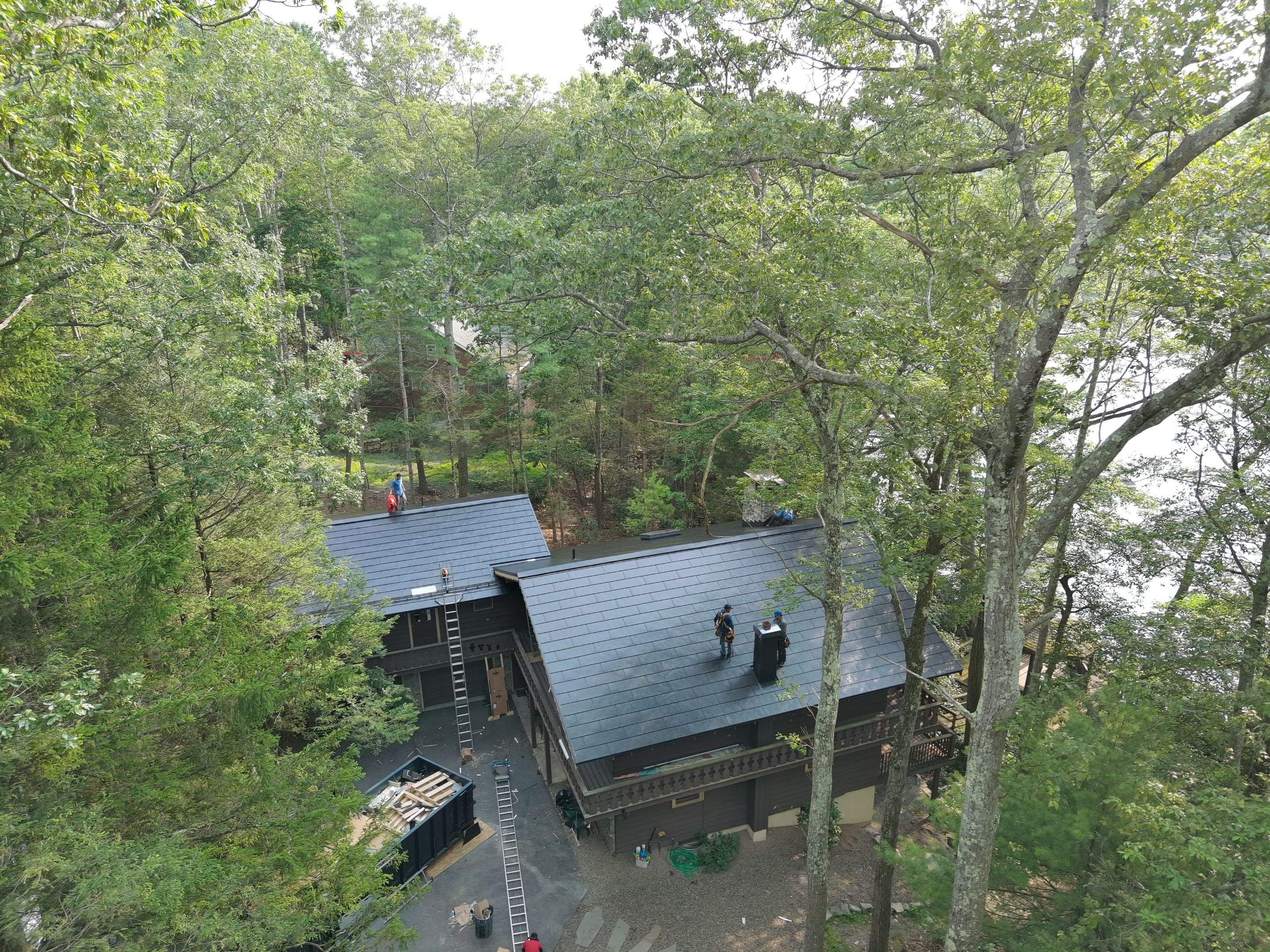 Stunning Tesla Solar Roof Cabin in the Woods by American Home Contractors