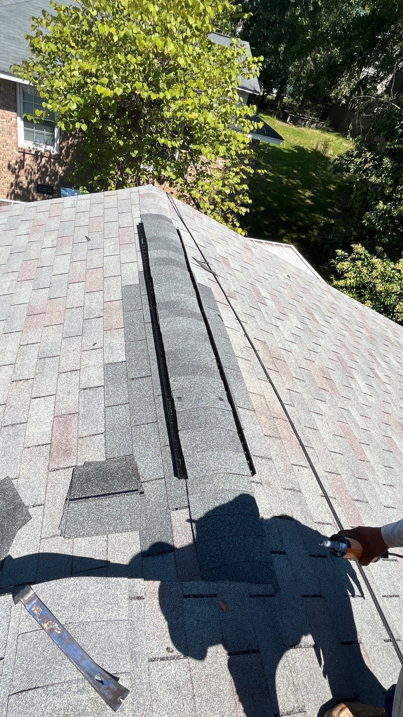 Chimney and Pipe Boot Flashing Roof Repair by Midlands Roofing & Exteriors