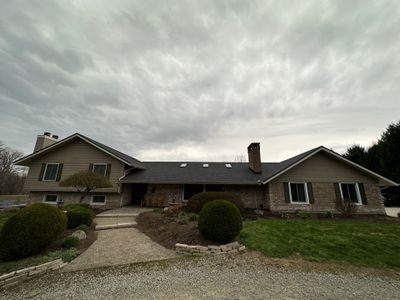 Residential Roofing Installation using Williamsburg Grey Duration Shingles