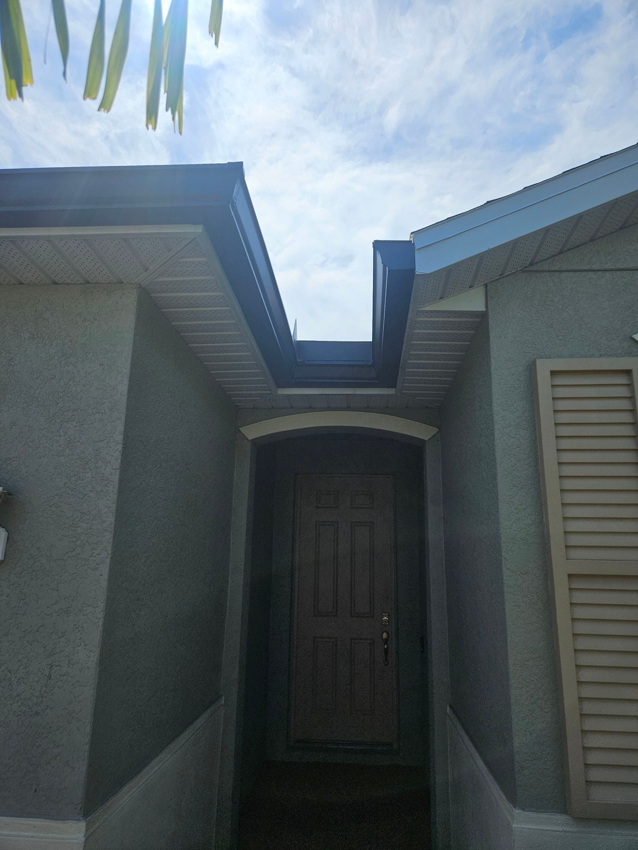 6-inch Seamless Aluminum Gutter Installation using Bronze gutters and Downspouts in Cape Coral FL by Gutter Professors