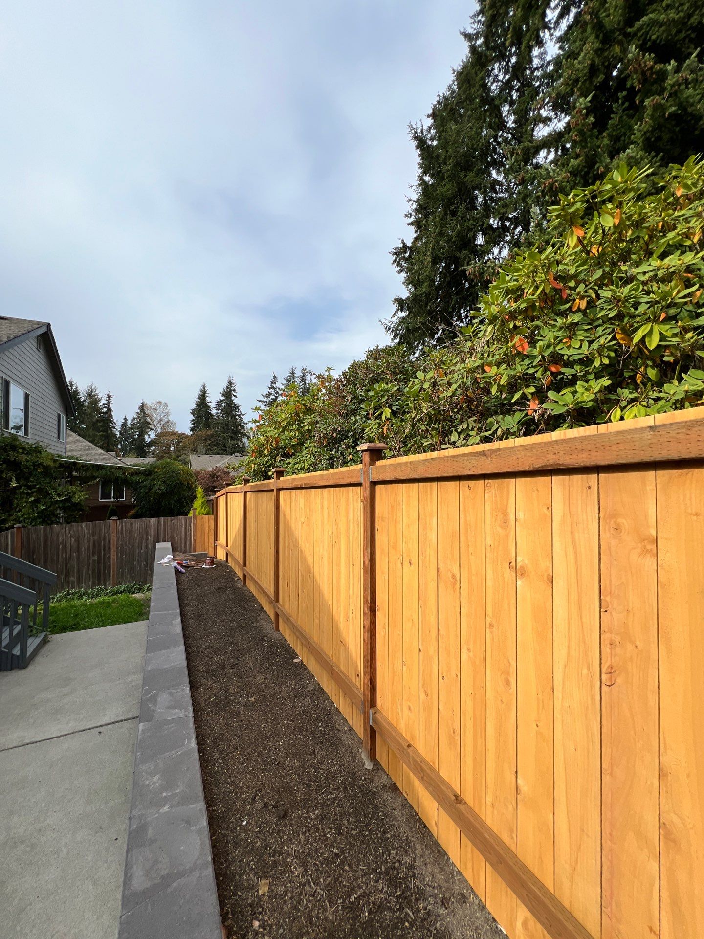 Jireh Outdoor Projects | Retaining Wall & Fence Build by Jireh Asphalt & Concrete Inc 