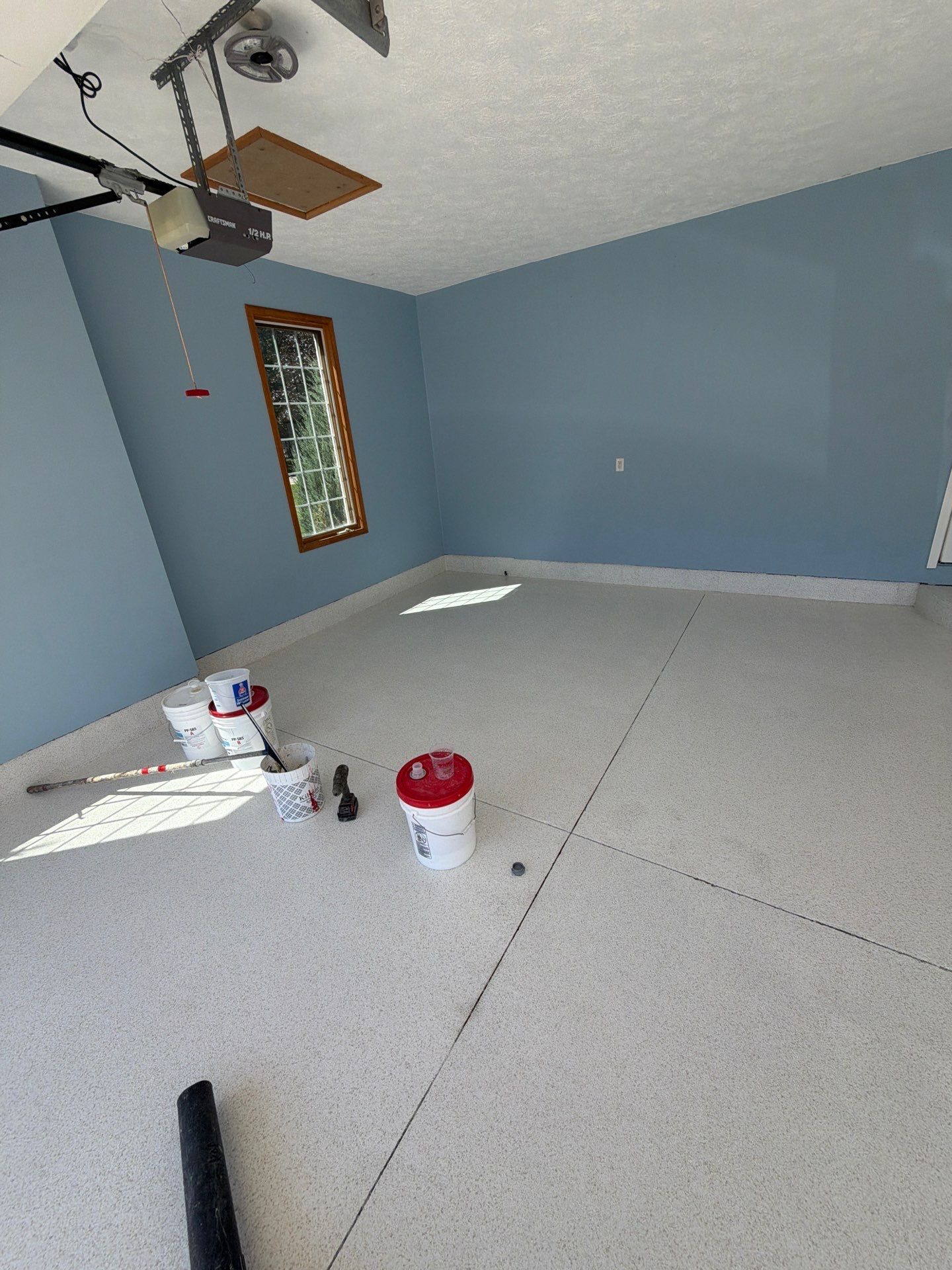 Custom Epoxy Flake Garage Floor Installation in Norton Shores by Gordon Painting