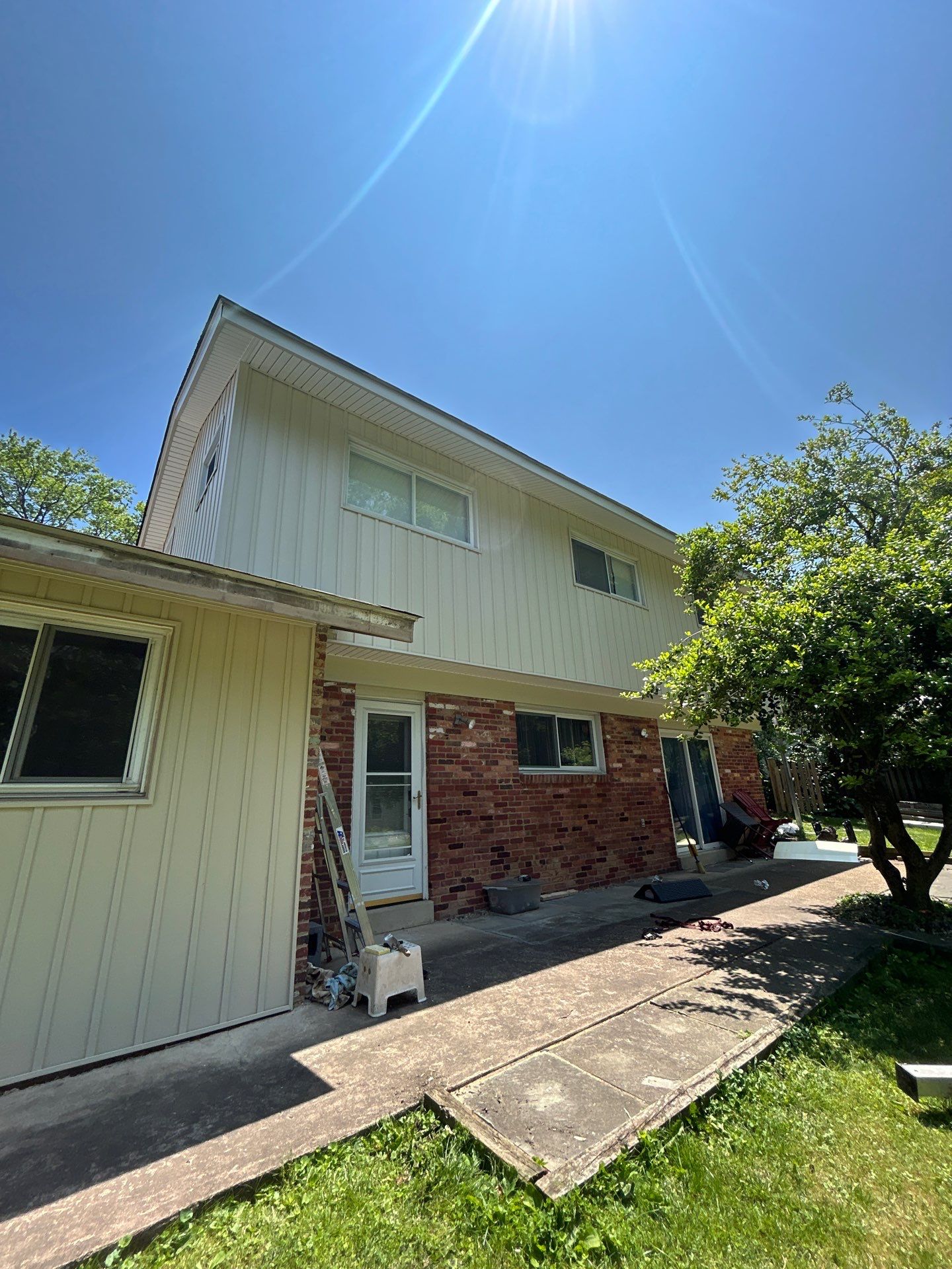 Fairfax: Residential Siding Replacement with CertainTeed 8" Board and Batten Siding in Desert Tan by RM Banning, Inc.