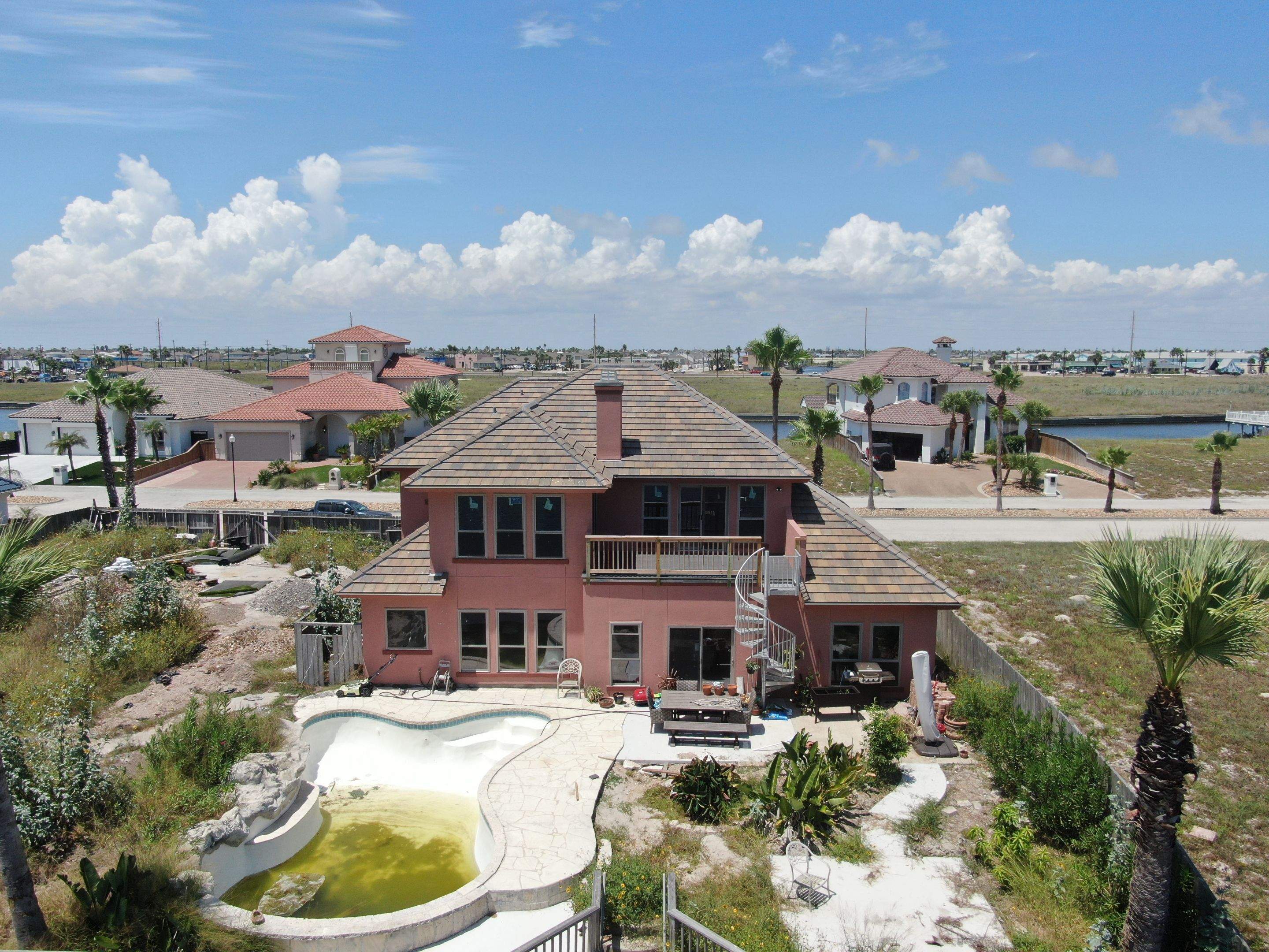 Busted to Beautiful! by Bayfront Roofing and Construction