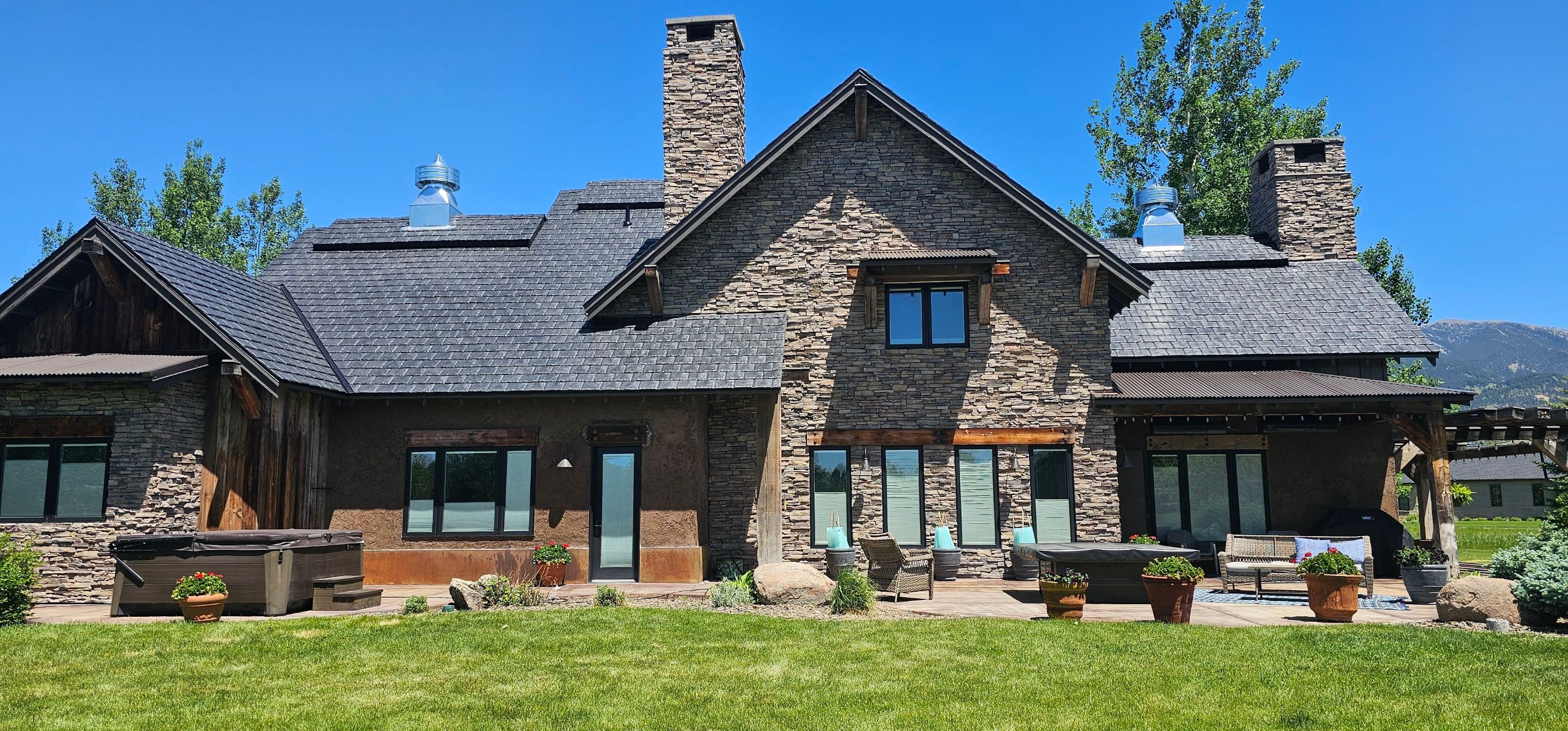 Residential Roofing Installation using Brava Synthetic Slate in Bozeman, MT by swagg construction