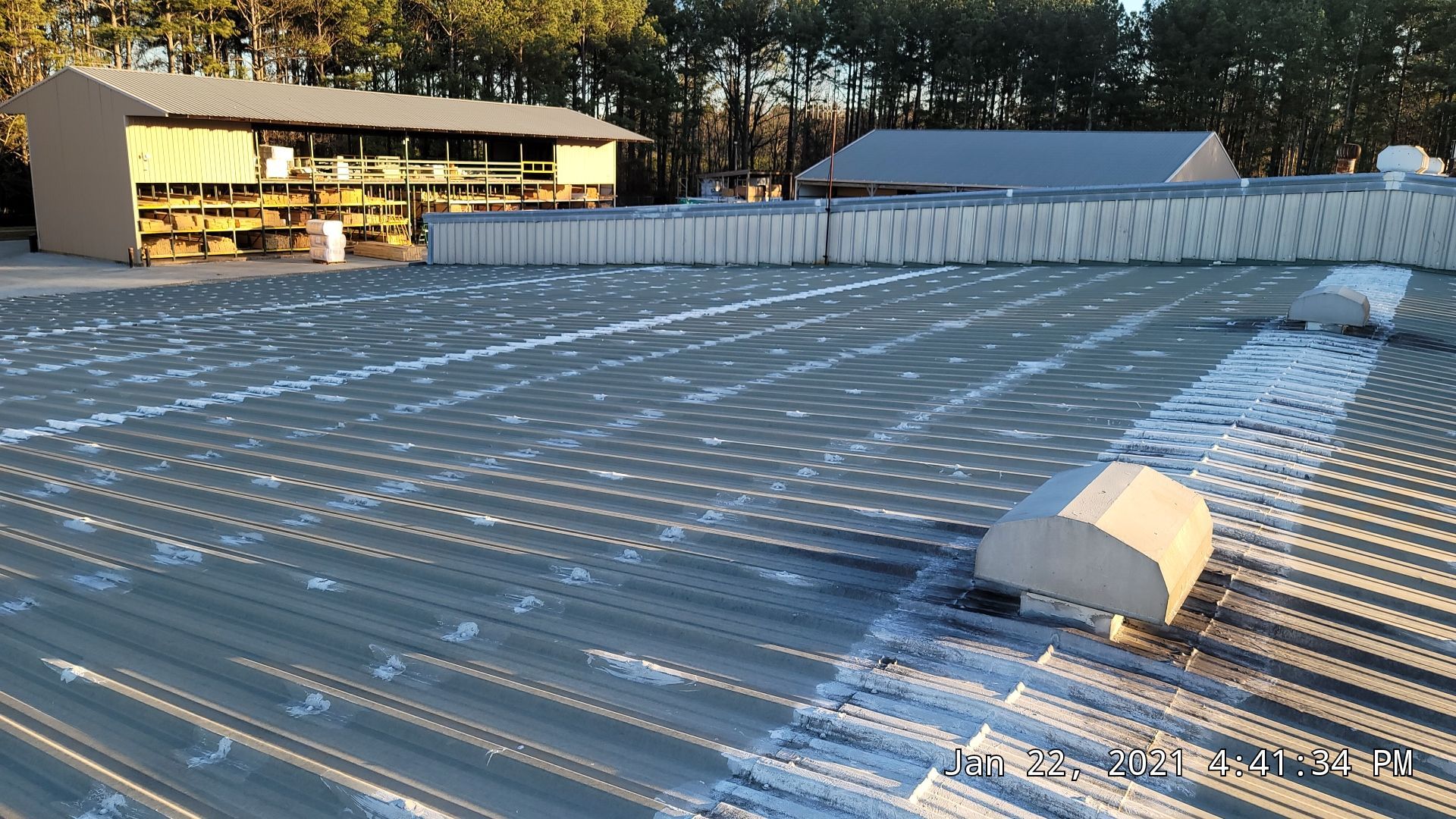 Commercial Roofing Installation using Aldocoat Coatings by Hostetler Roofing
