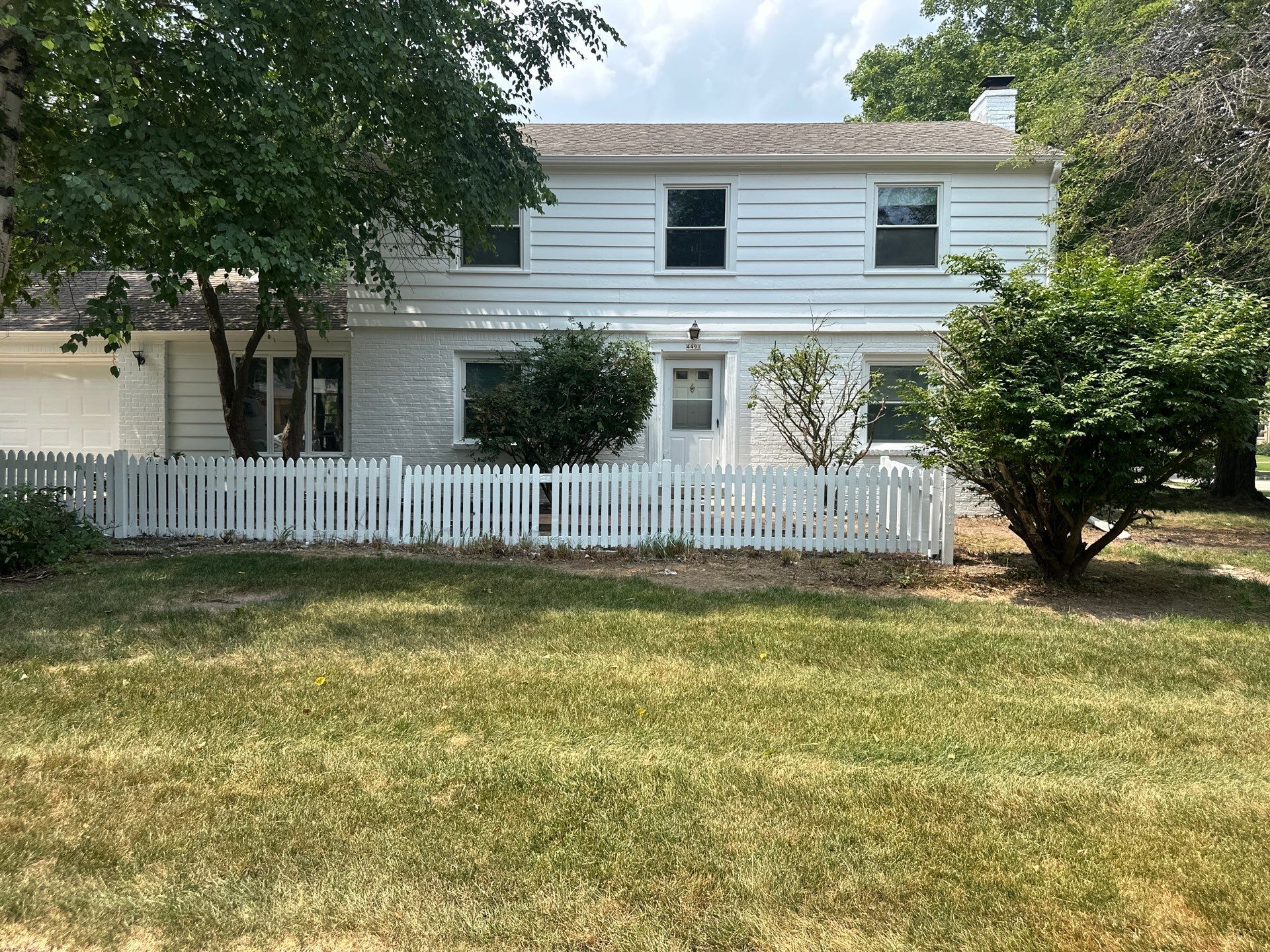 Shorewood Exterior Painting and Siding Refresh With Contrast Trim by OCS Contracting Services