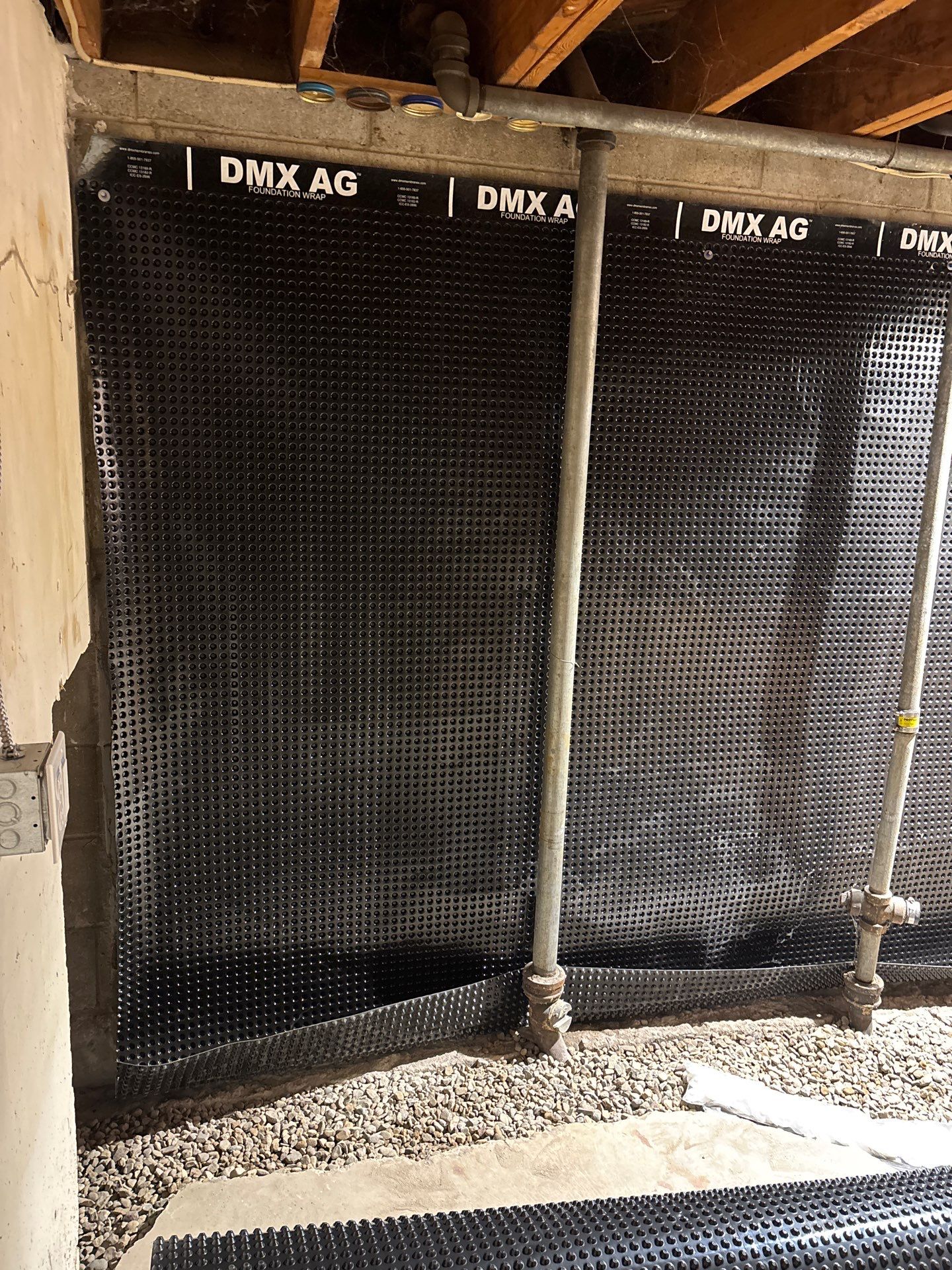 Interior Drain Tile & Buried Discharge in South Minneapolis by Waterproofing Northeast