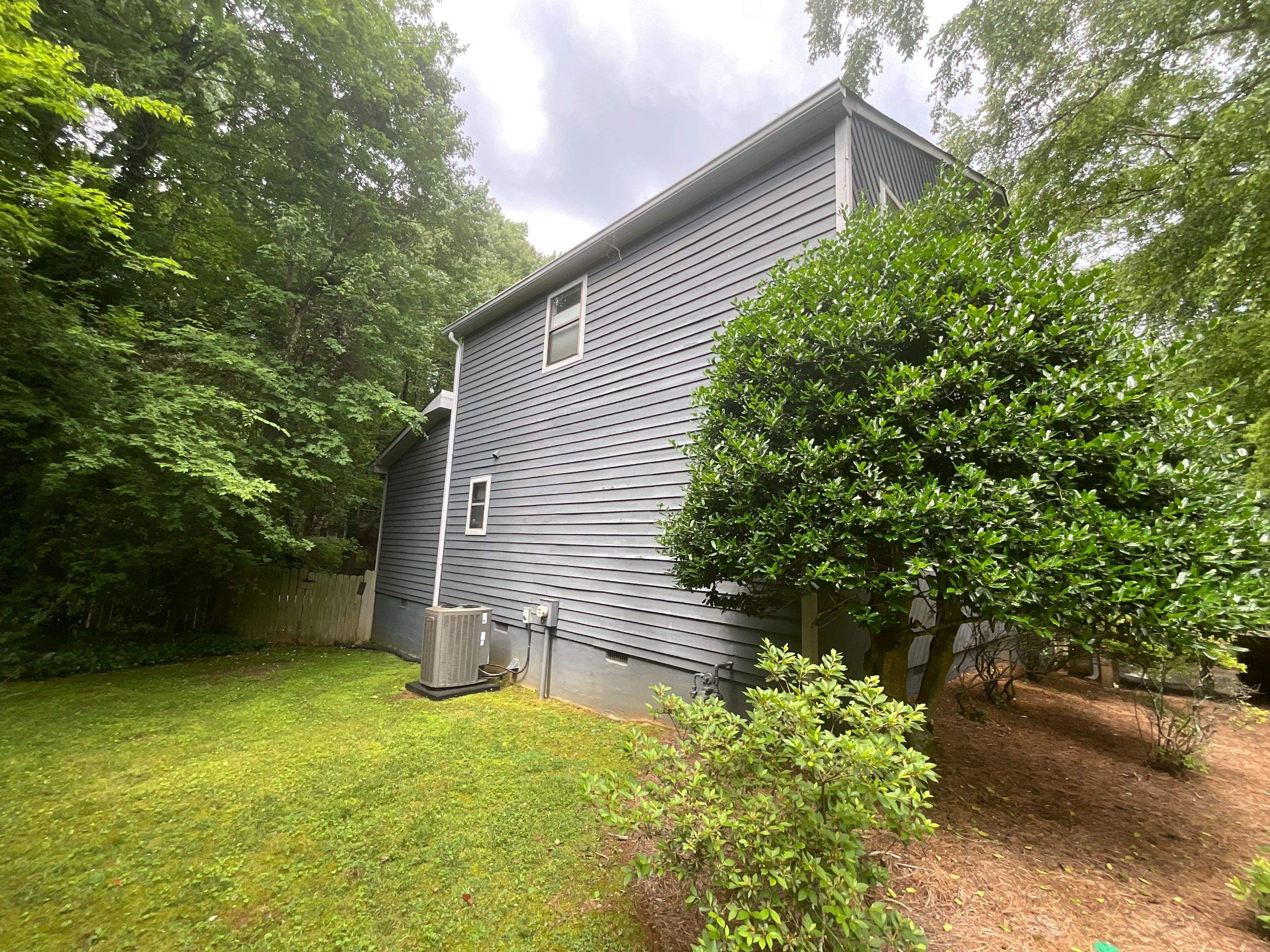 Dark Grey Exterior Painting and Front Door Refresh in Marietta by Swift Home Renovations