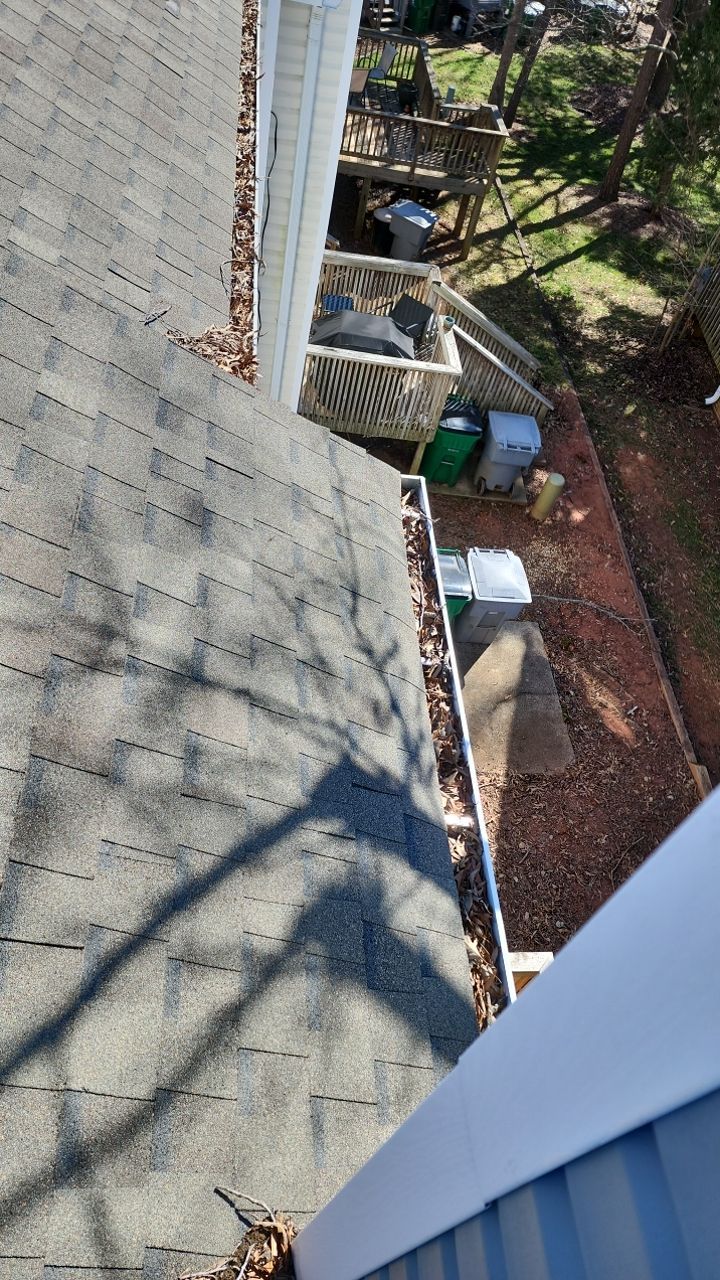 Gutter Cleaning using water by Power Wash Masters LLC