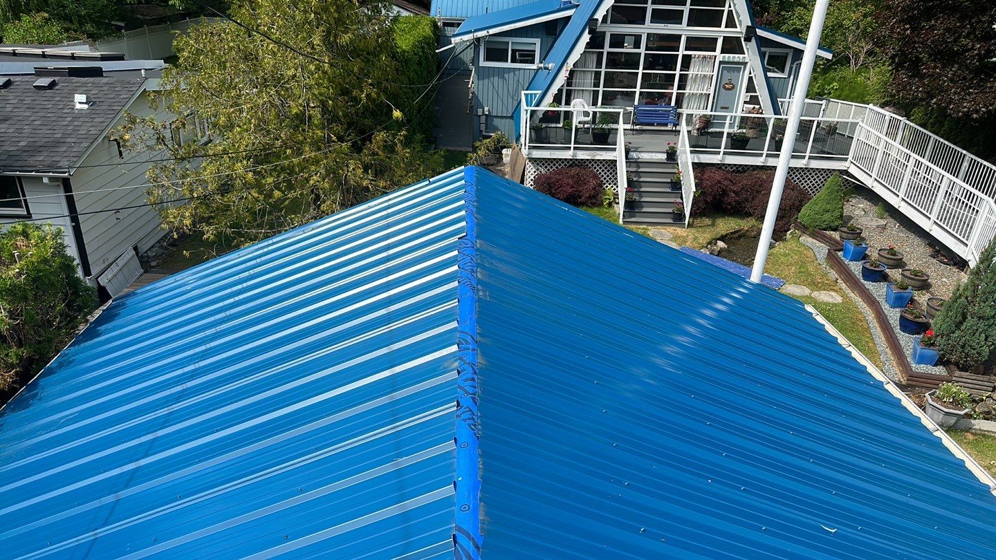 Residential ReRoofing Installation using Duraclad 26ga by Top Notch Roofing Inc