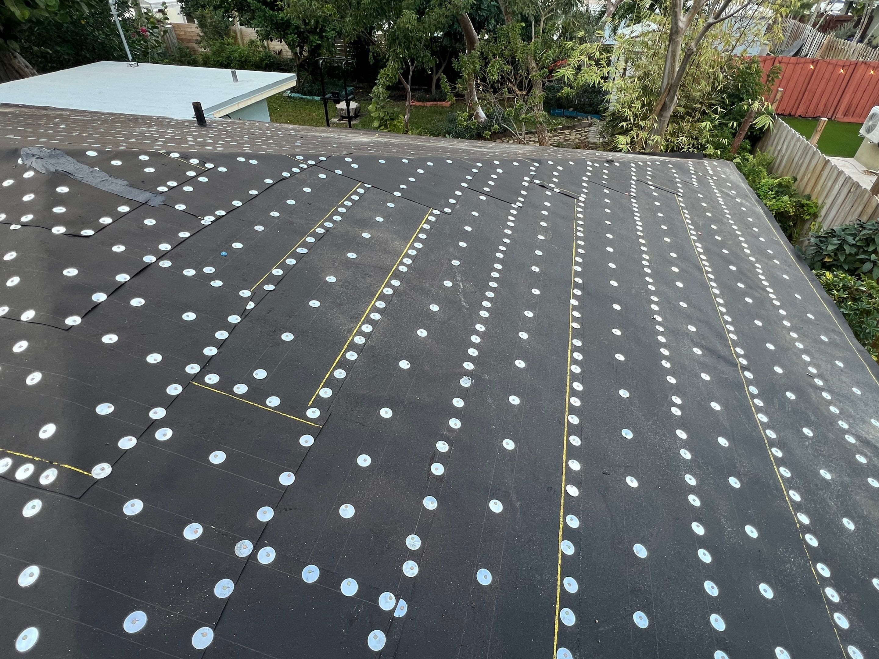 Residential Roofing Installation using 1" Nail strip metal roof by BLUES BROTHERS ROOFING