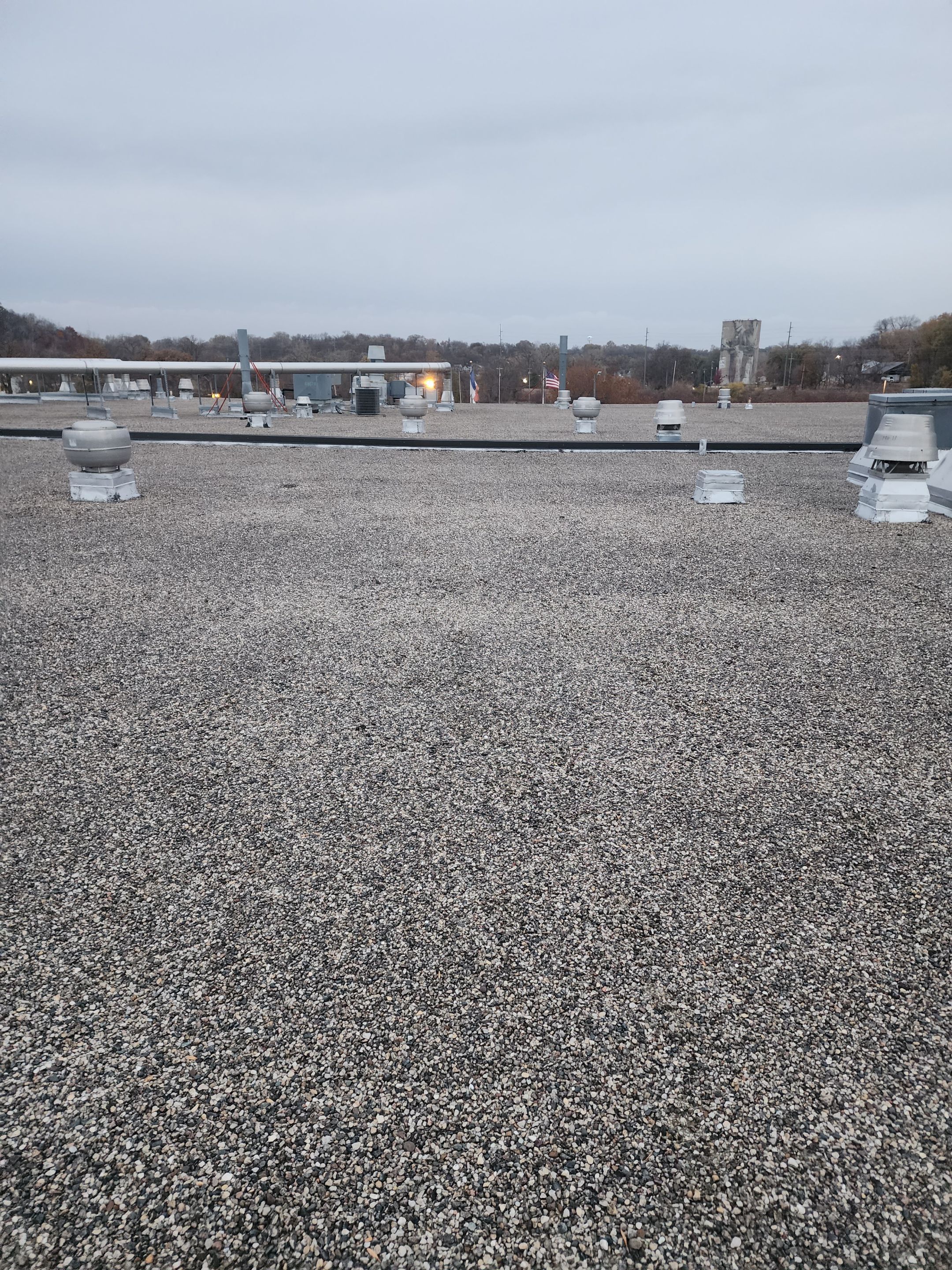 AML Riverside  by Grell Roofing, LLC