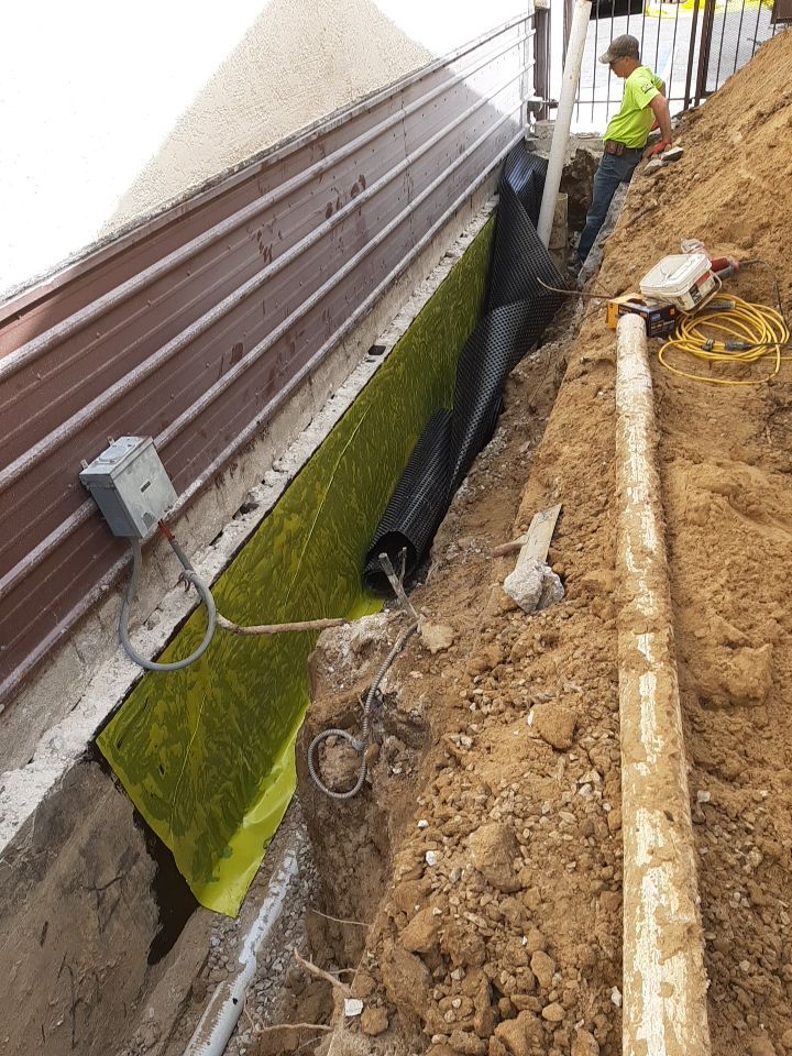Exterior Deep Waterproofing System with Wall Push Back and Steel Beams Reinforcement by Toledo Basement Repair