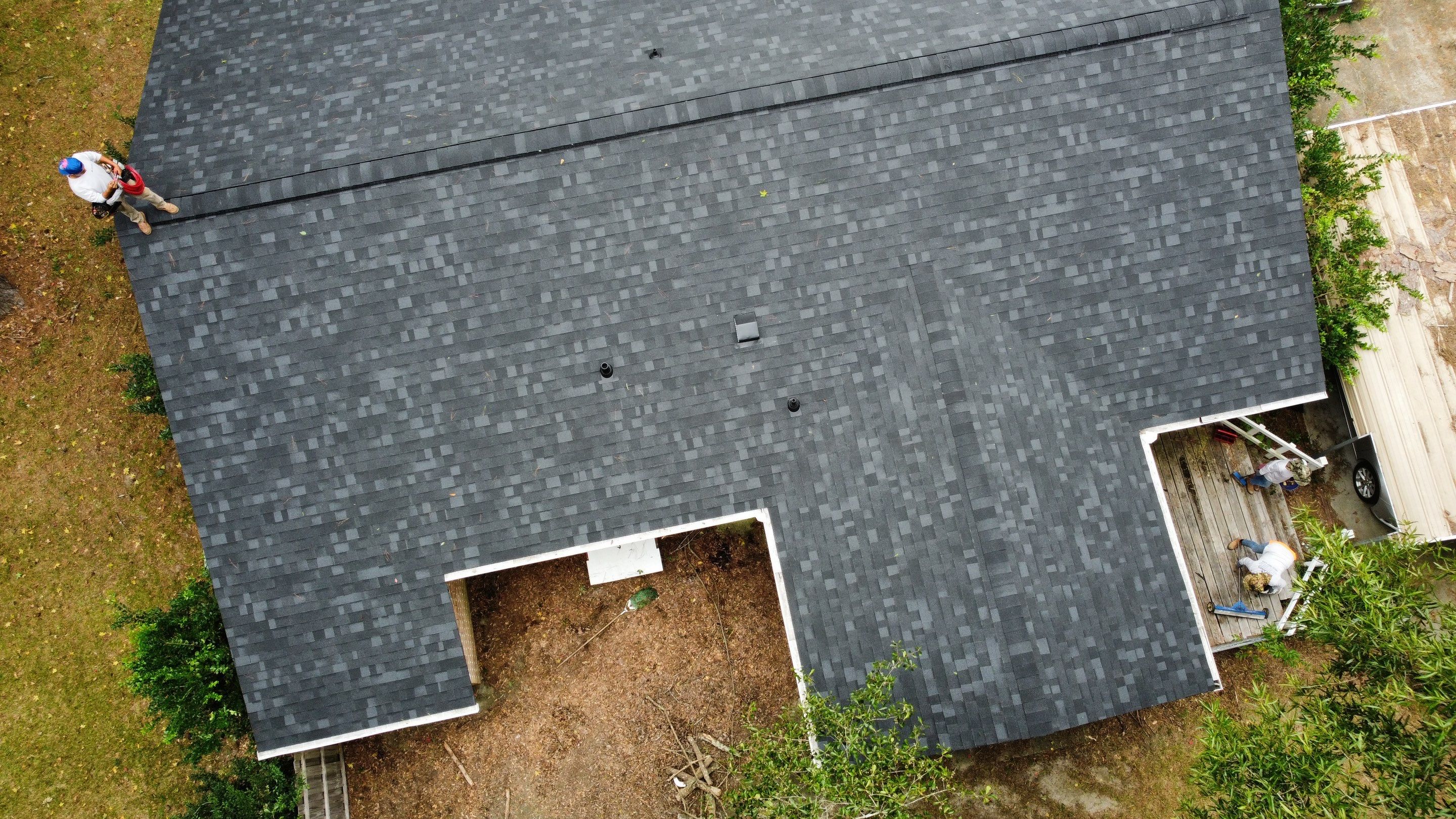 New Onyx Black Shingle Roof Replacement and Tree Damage Repair. by Midlands Roofing & Exteriors