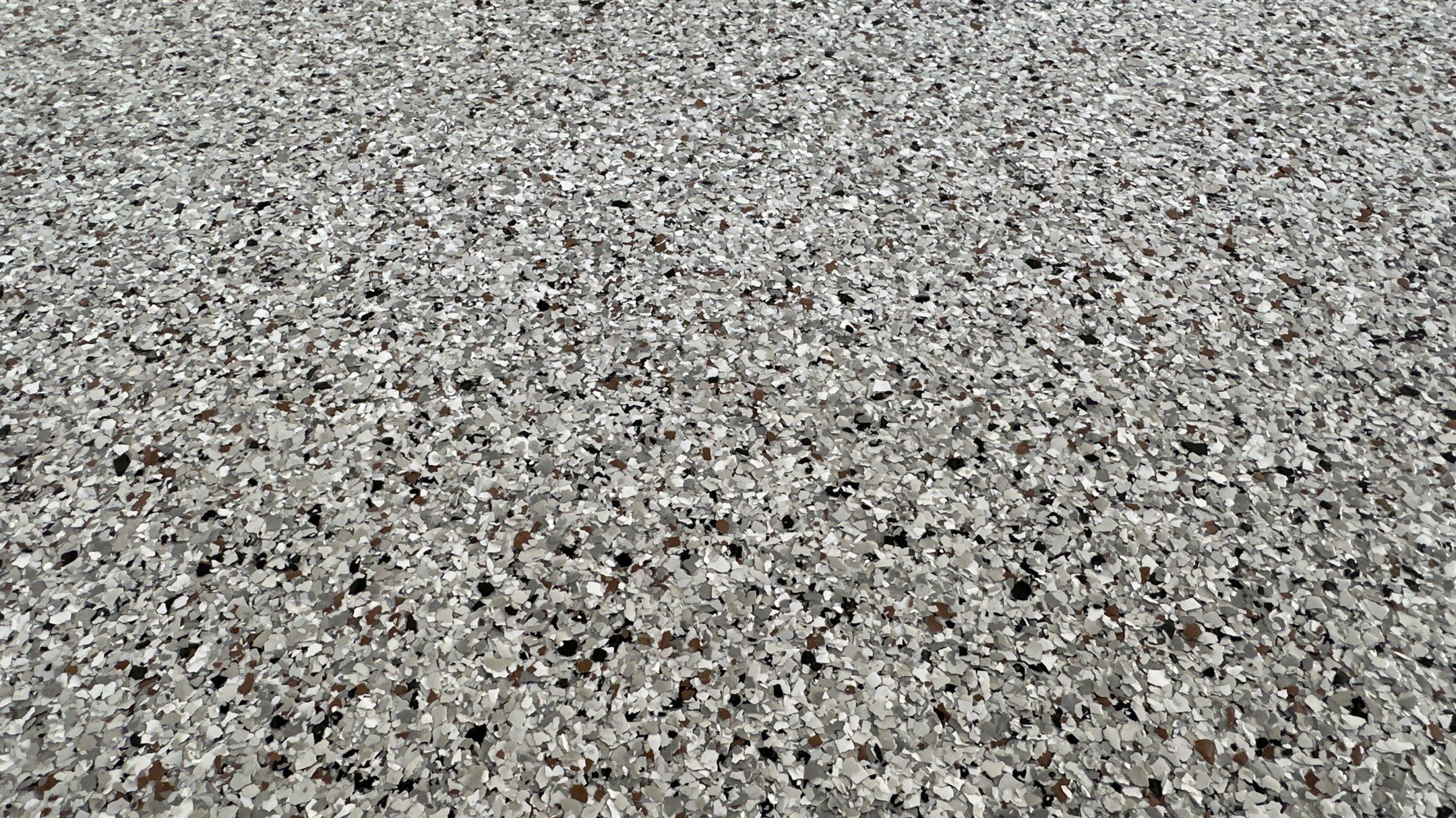 Mike M. got him self a beautiful Coyote flake floor by Banner Garage