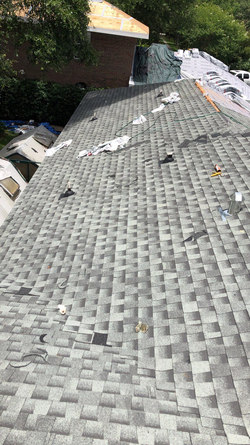 Residential Roofing Installation using Roof Replacement by American Roofing & Construction LLC