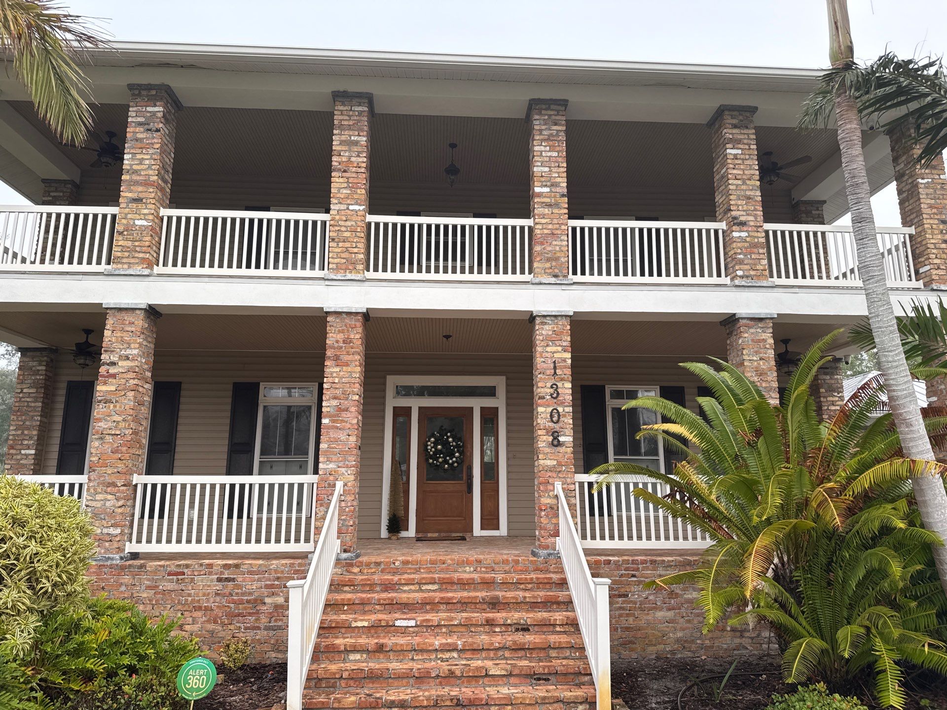 2-Story House Wash and Garage Pressure Washing in Palmetto, FL by Sunshine AquaWash