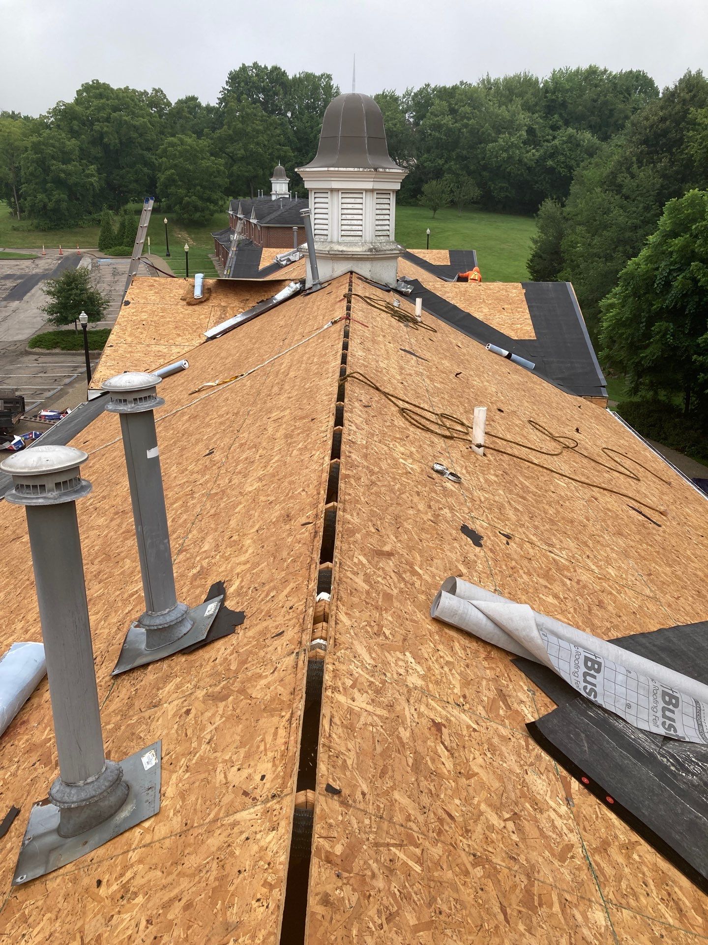 Commercial Roofing Installation using GAF Timberline HDZ Charcoal by Rainstoppers Roofing