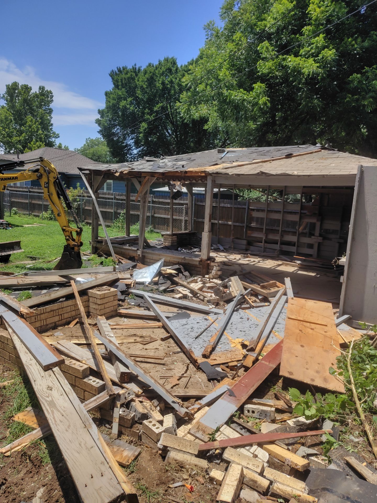 Demo , Concrete Pad, And Cedar Fence by Clays Services Inc