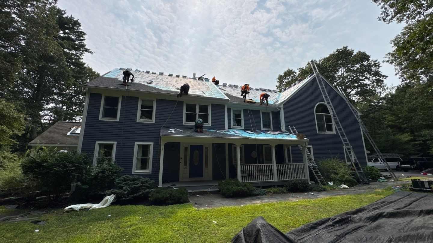 Solar-Ready Roof Replacement with GAF Pewter Gray Shingles & VELUX Skylights by Sensible Home Solutions