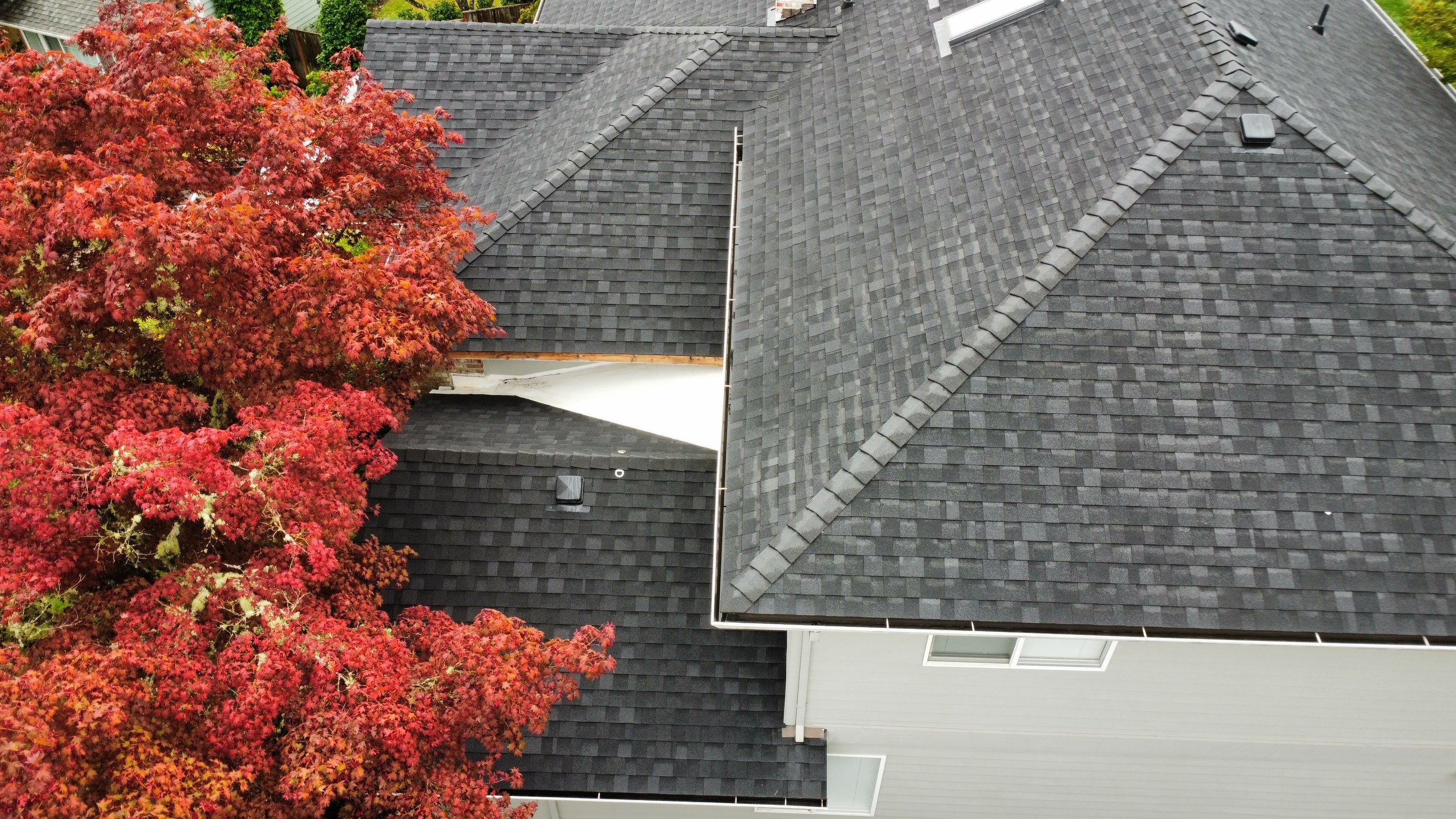 Residential Roofing Installation using IKO Dynasty (Color: Granite Black) by Orezona Building & Roofing Company, Inc.