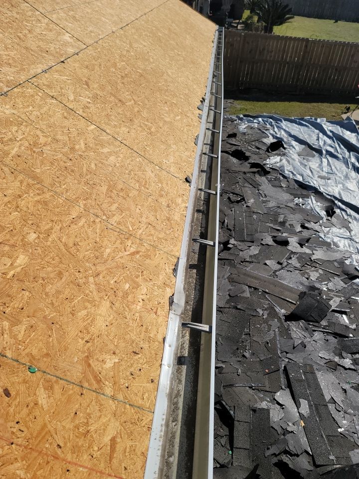 Residential Roofing Installation using Roof Replacement by American Roofing & Construction LLC