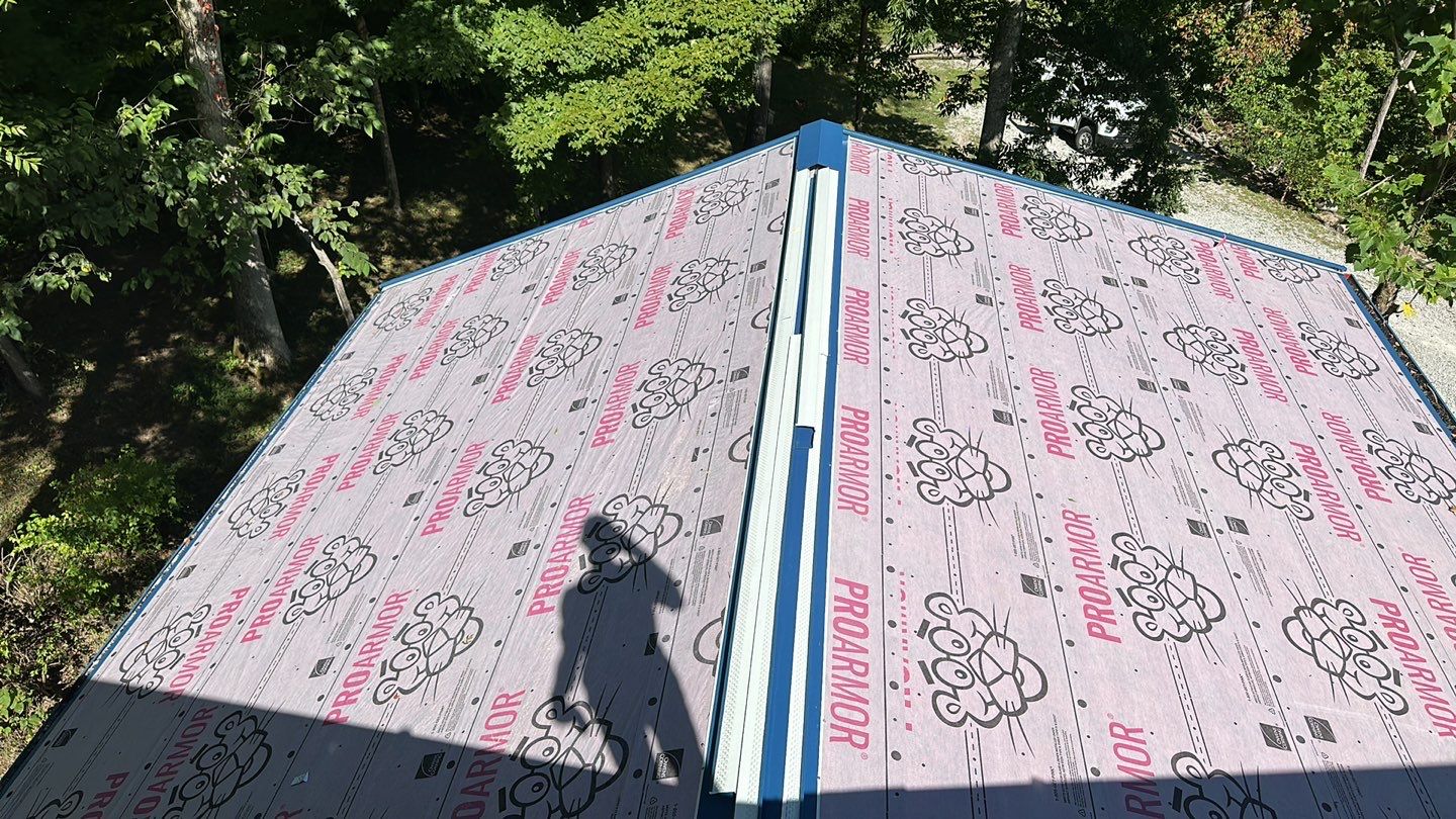Residential Roofing Installation using Standing Seam Metal - Gallery Blue by RoofX 