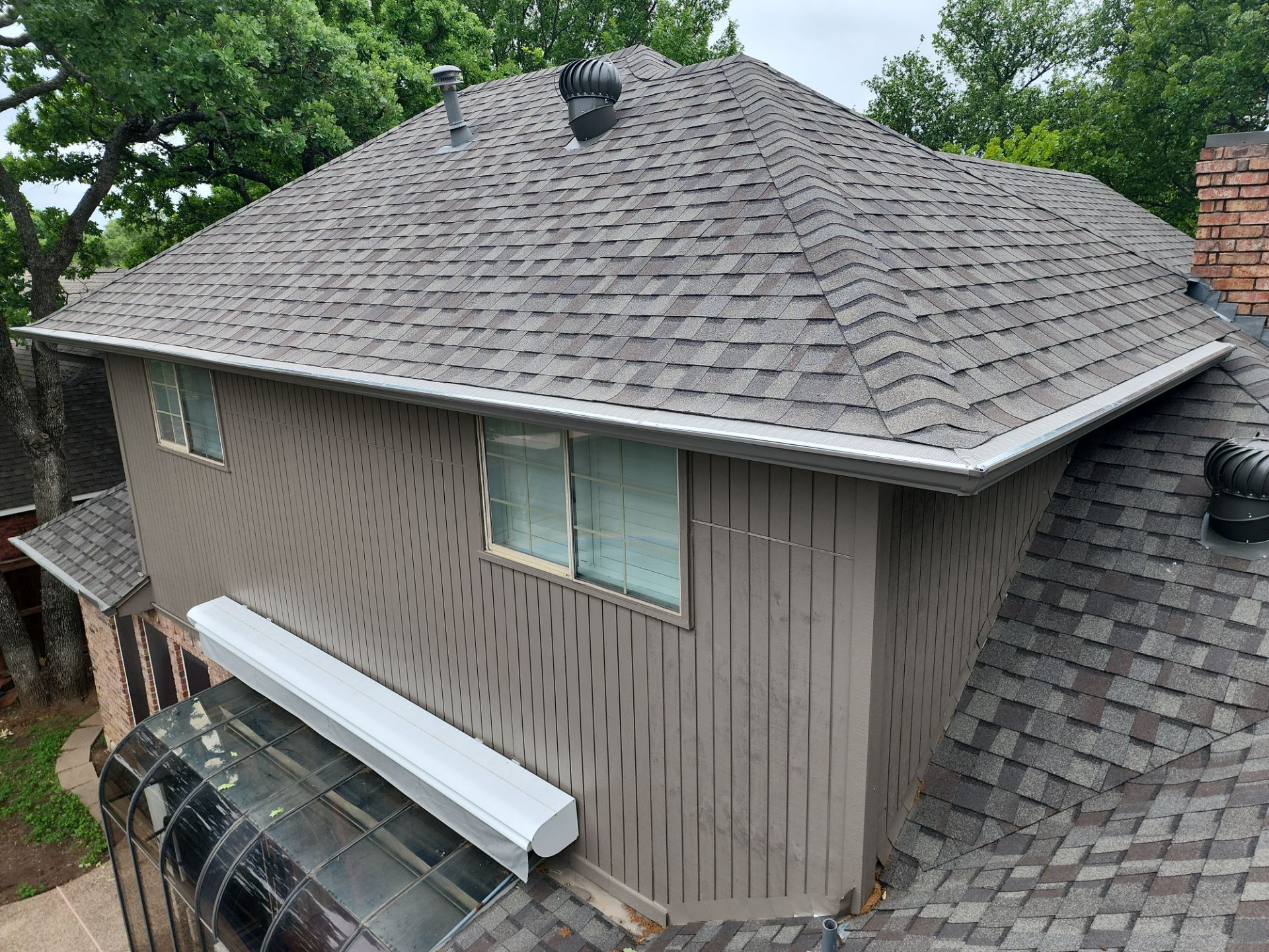 Roof, Gutters, Chimney Chase, Skylight Replacement by 3:16 Roofing and Construction