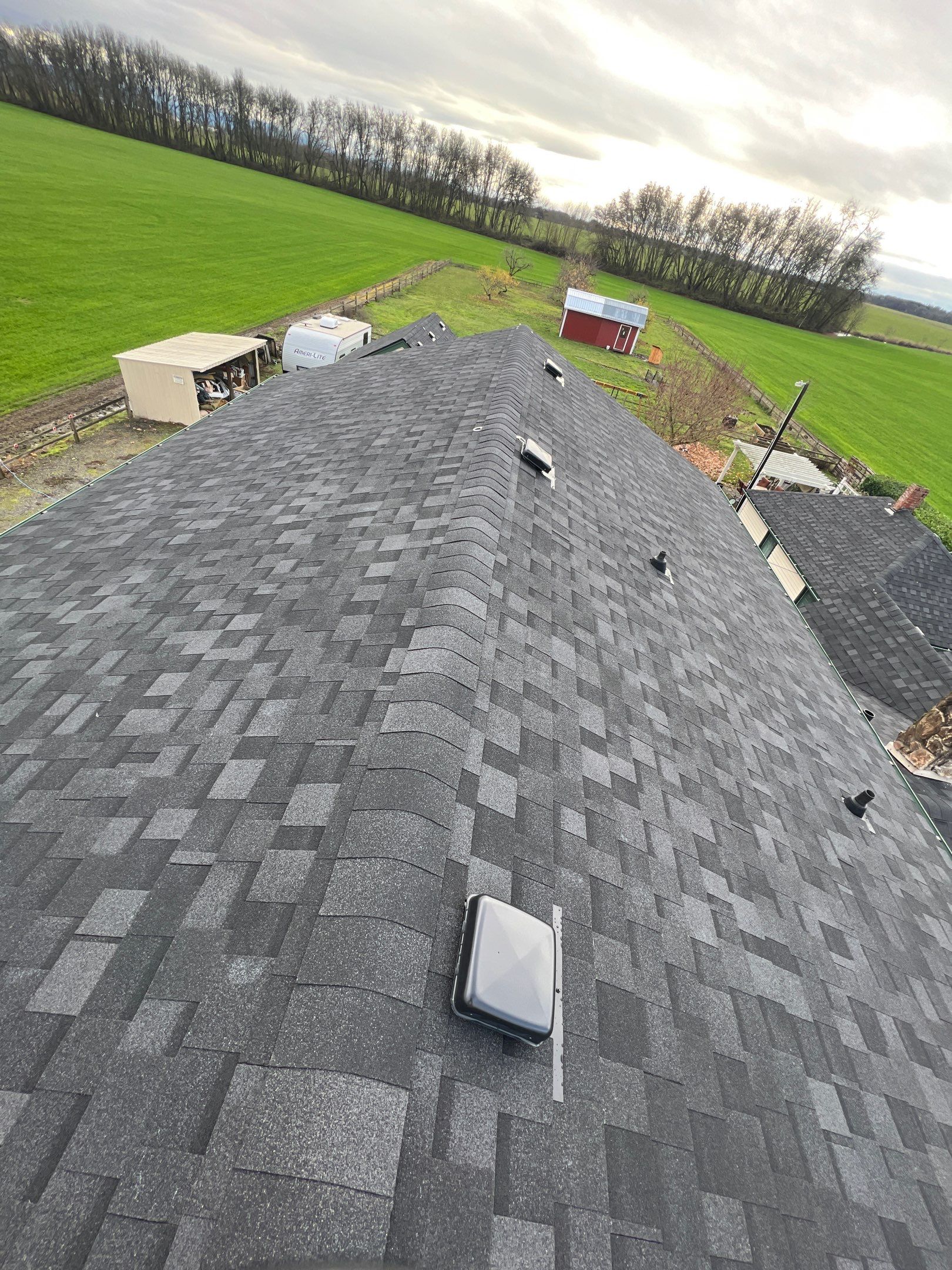 Residential Roofing Installation using IKO Dynasty (Color: Granite Black) by Orezona Building & Roofing Company, Inc.
