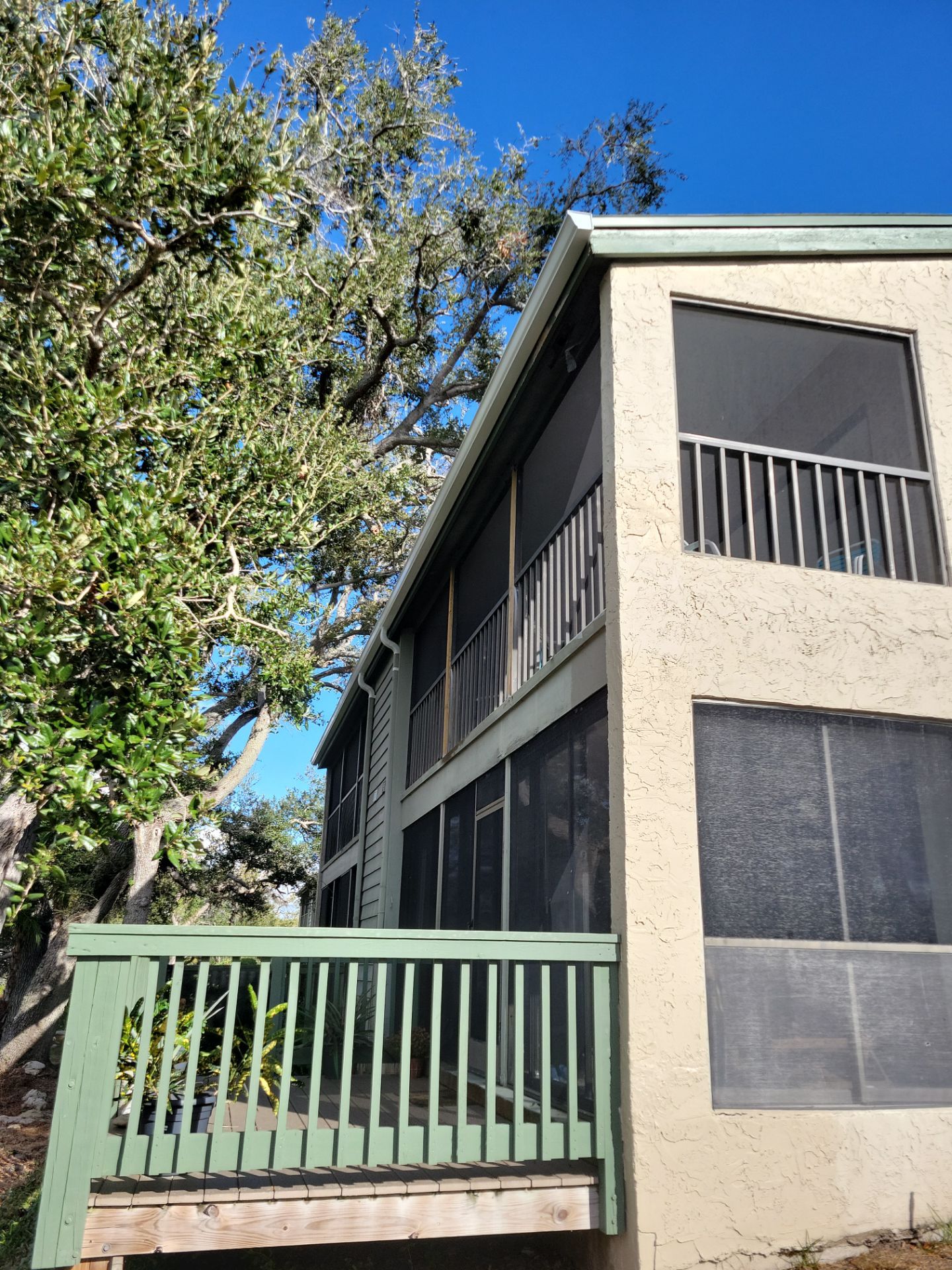 White Gutters Repair and Installation in Sarasota FL by Gutter Professors
