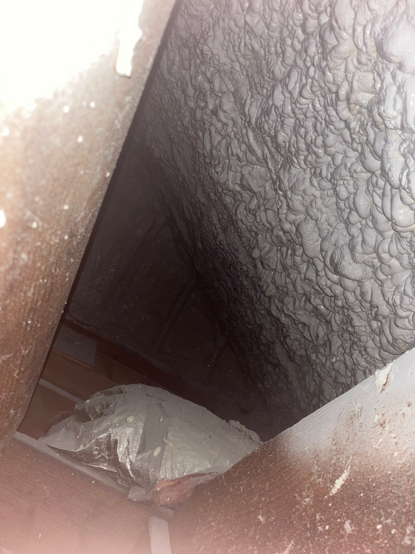 Attic Retrofit using open cell spray foam by NYS Foam & Energy