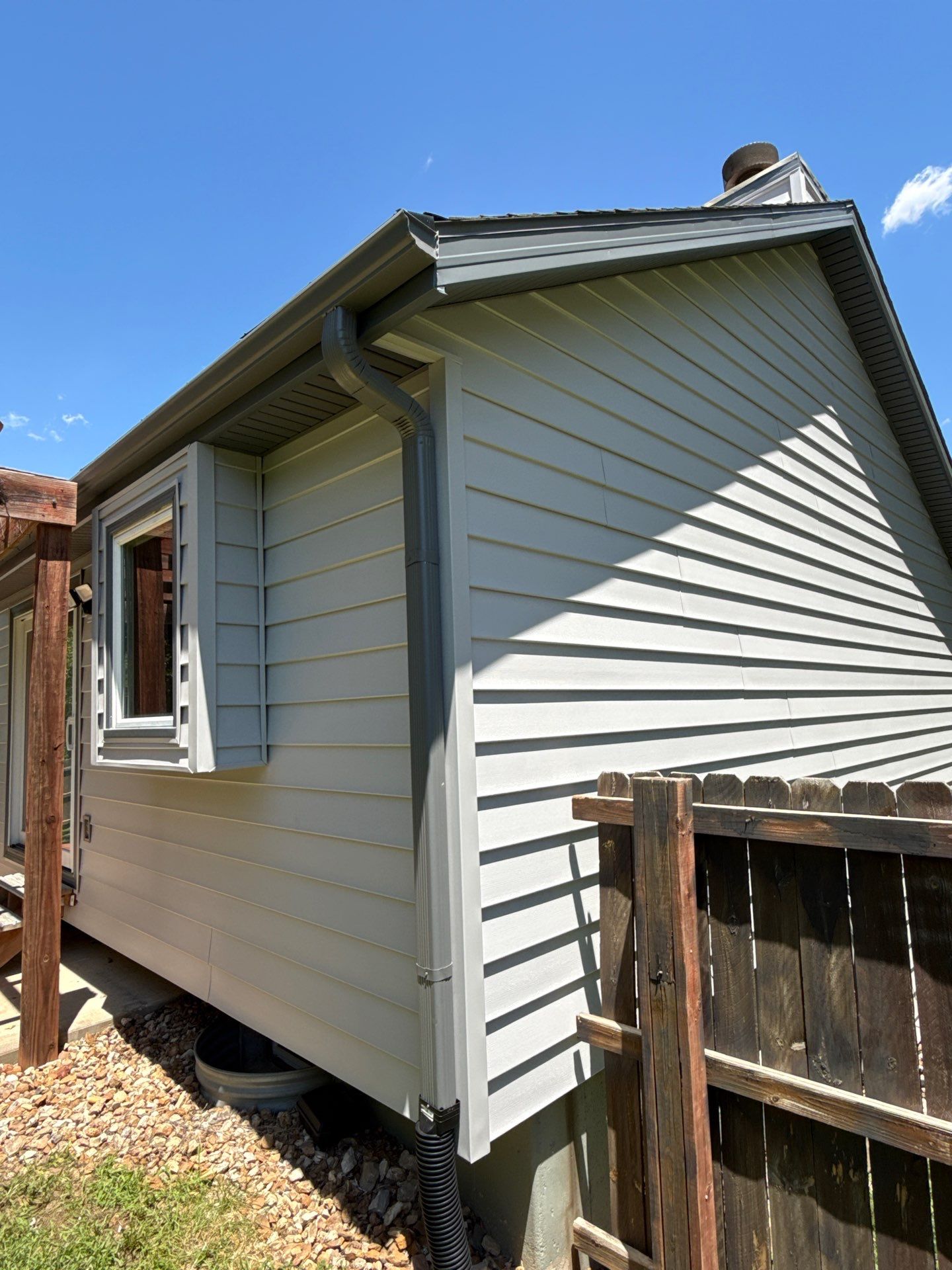 Whole-Home Craneboard Siding Replacement and Exterior Renovation in Shawnee by EEC Windows, Siding & Roofing