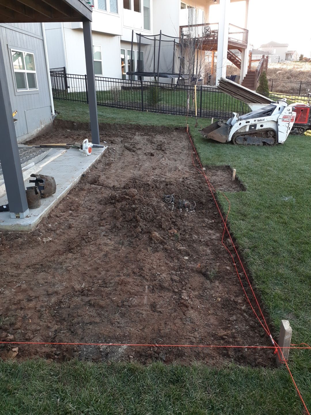 Back Yard Paver Patio by LAND ESCAPES LLC
