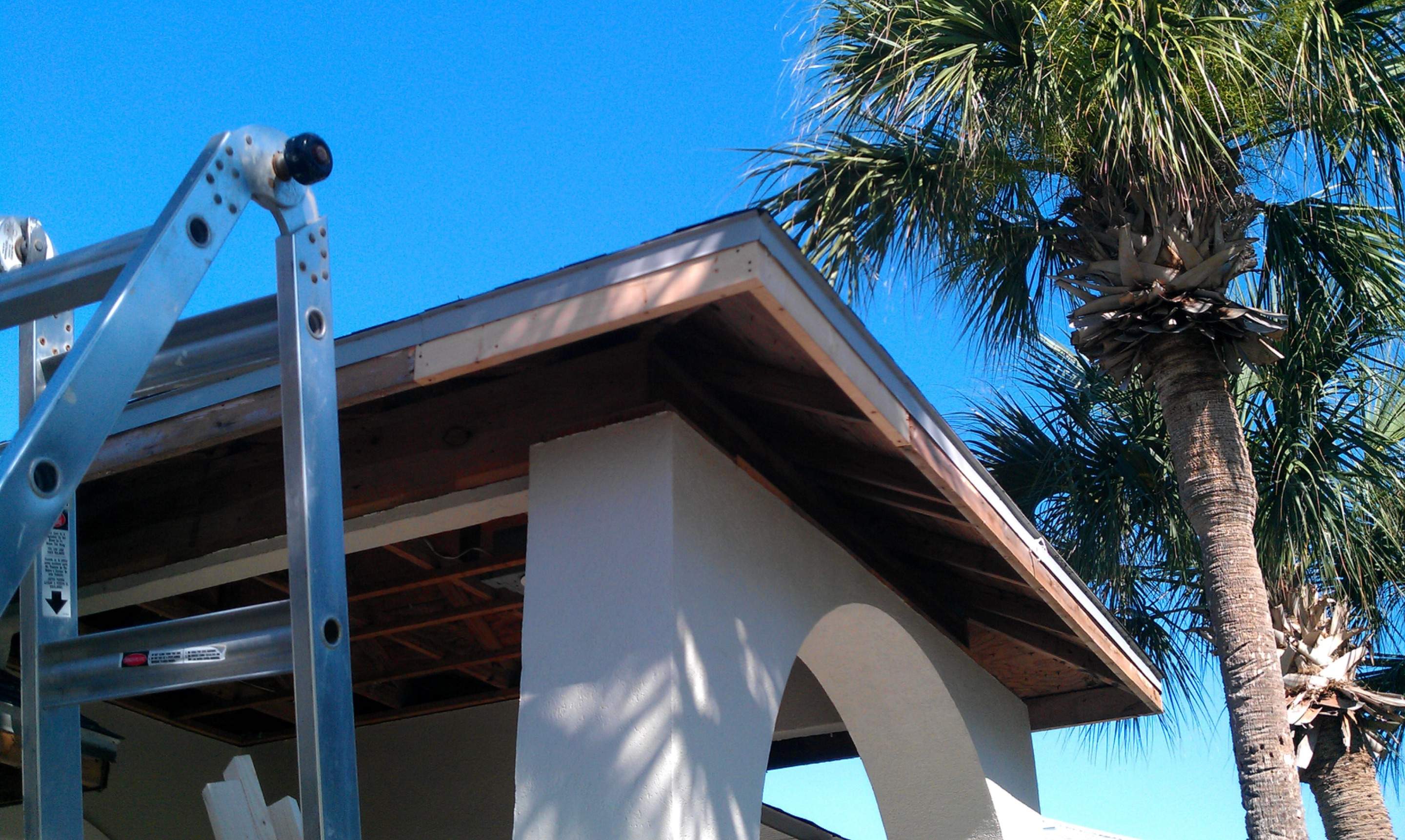Rotten Wood Fascia Replacement for Malabar Screened Patio by Florida Roofing and Renovations Inc.