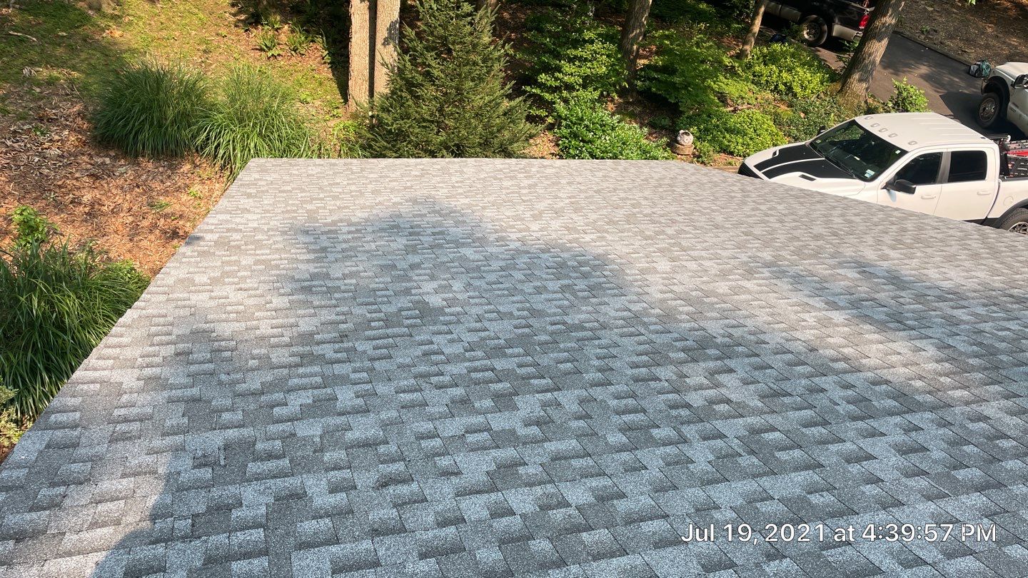 Deckhouse Roof Replacement by American Home Contractors