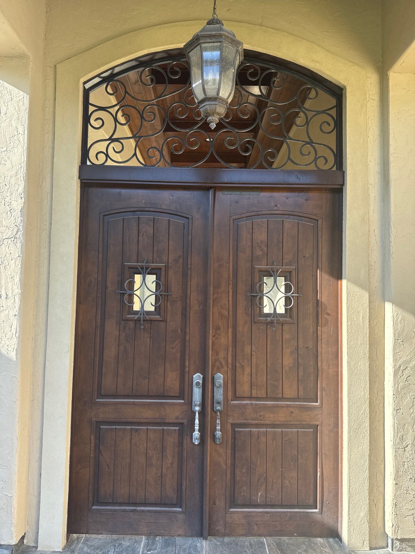 Complete Exterior Painting and Stucco Refinishing in Spring by Rolling Nations