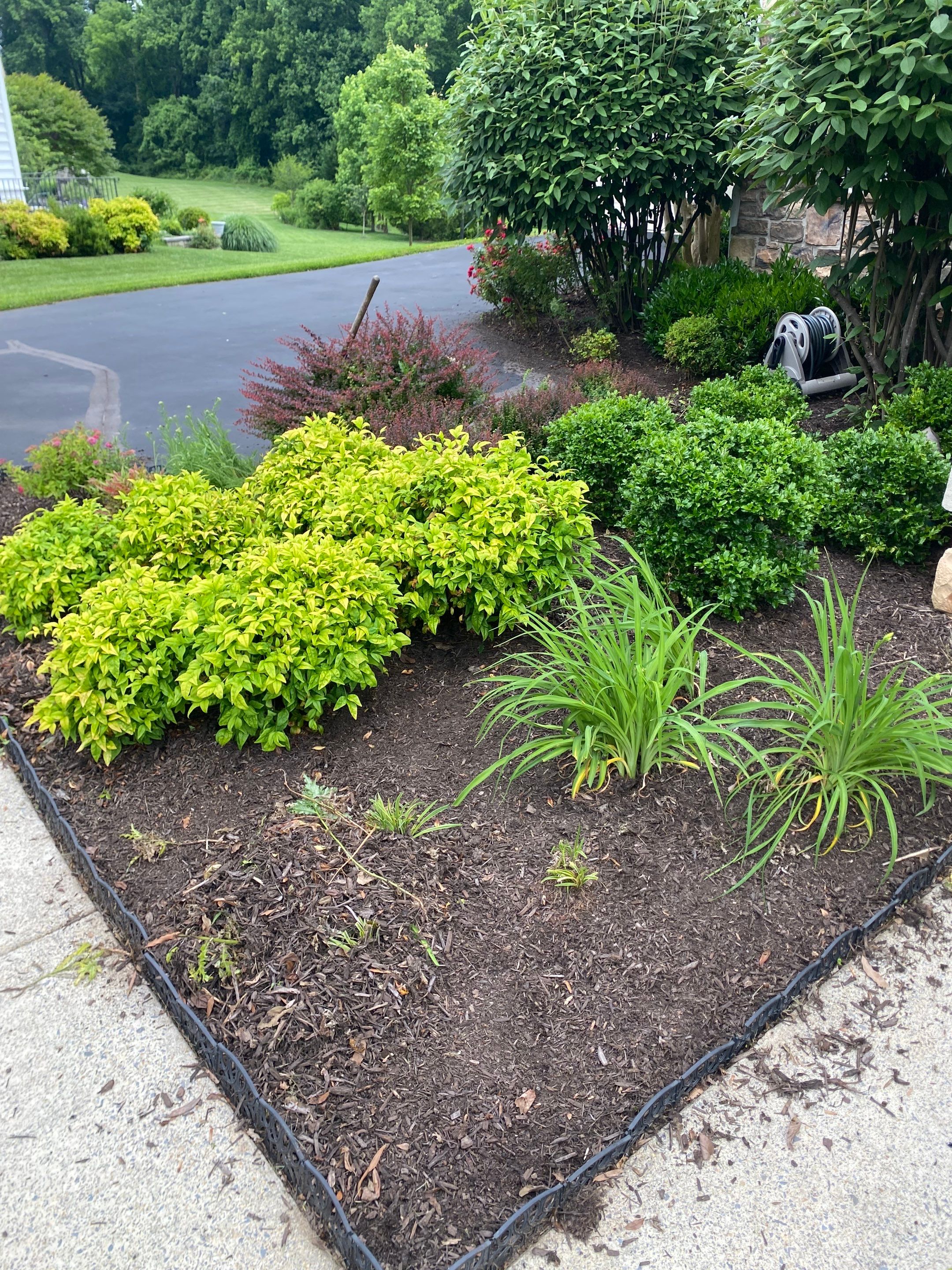 Landscape Cleanup & Mulch  by The Smet Companies, LLC