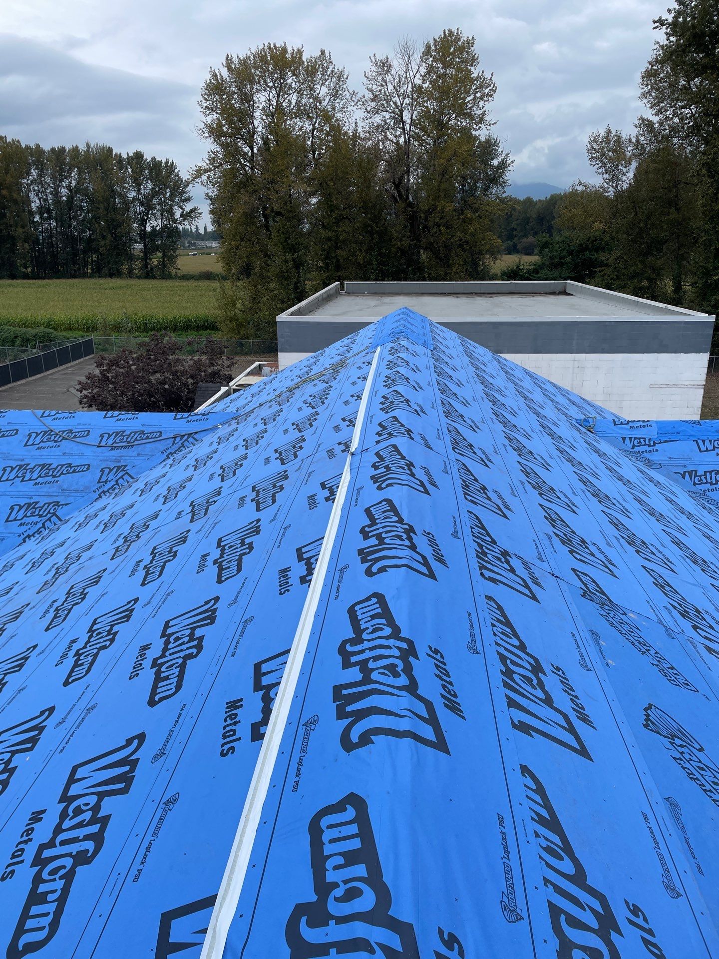 Commercial Shingle to Metal Conversion using Prolok 12 - 26g - Standard option by Top Notch Roofing Inc