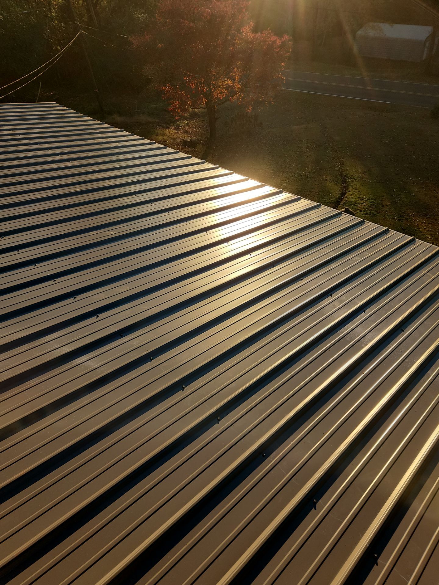 Roof Replacement in Pinson (Metal Roof) by The Roofing Dudes