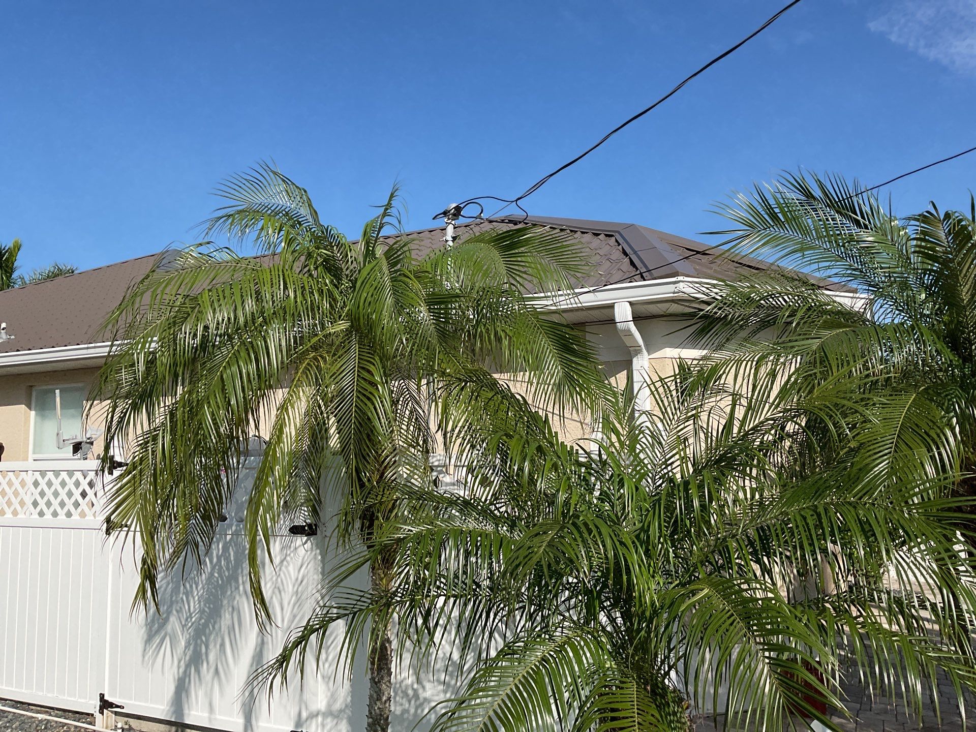 Brown Seamless Gutters Installation in Cape Coral FL by Gutter Professors