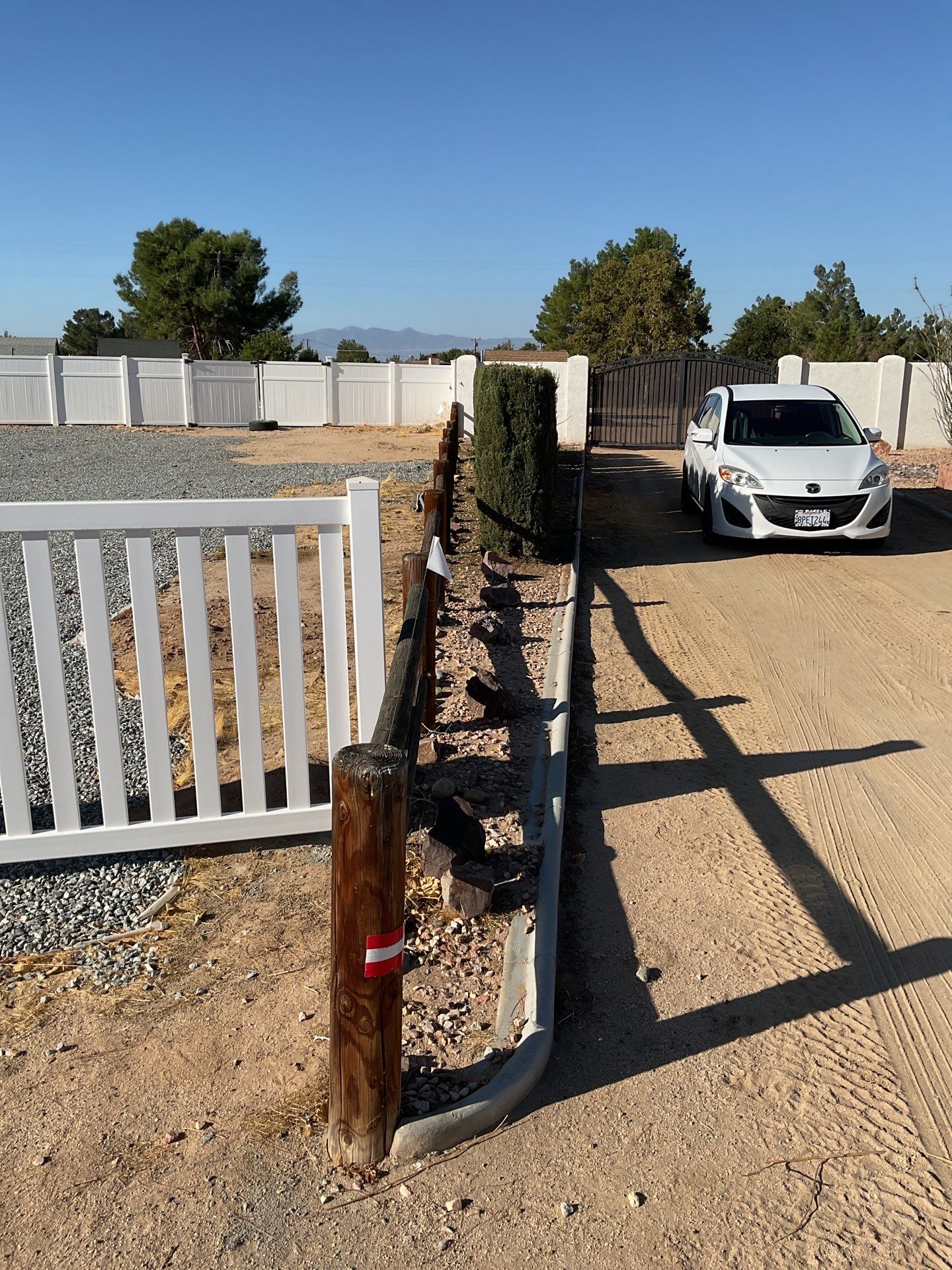 Fence Installation using Ranch Style Vinyl by Fence Guys Inc. 