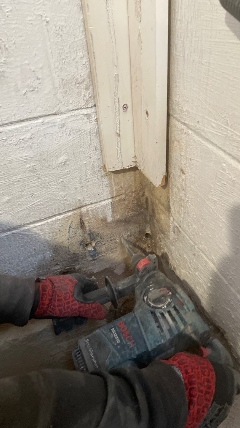 Interior Drain Tile & Buried Discharge in St. Anthony, MN by Waterproofing Northeast