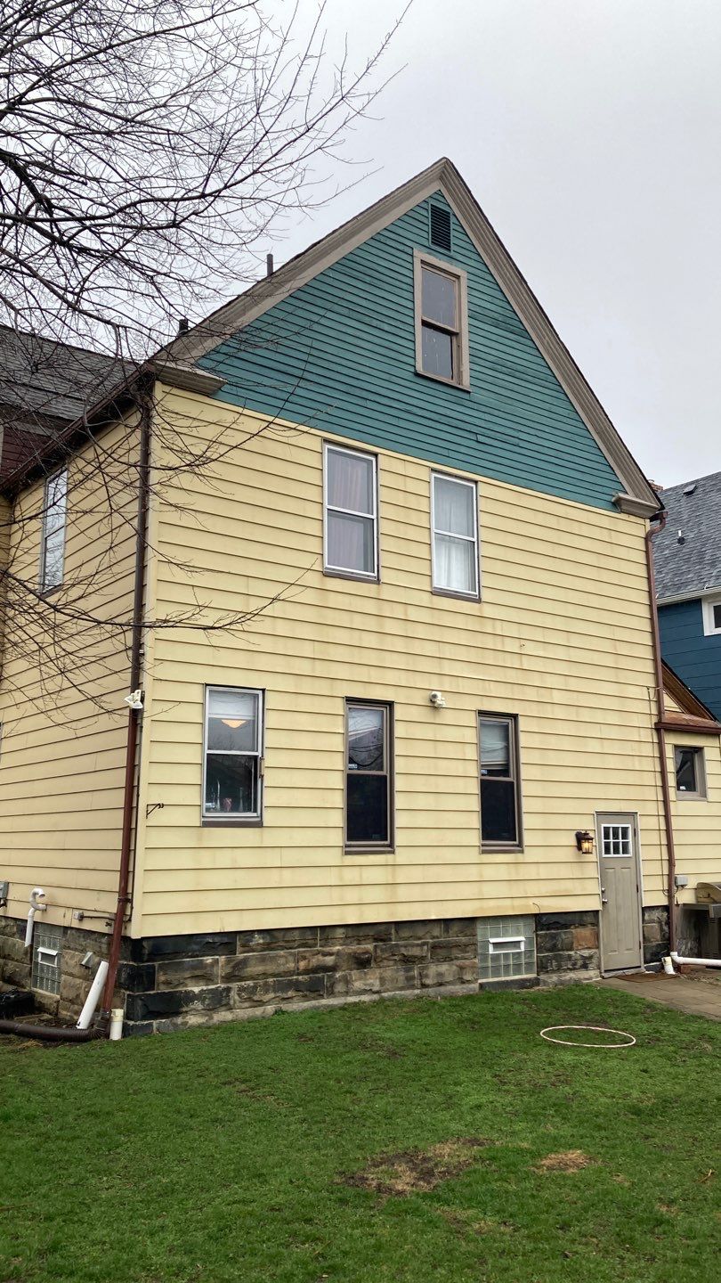 James Hardie Siding on Antique Home by Absolute Roofing and Construction