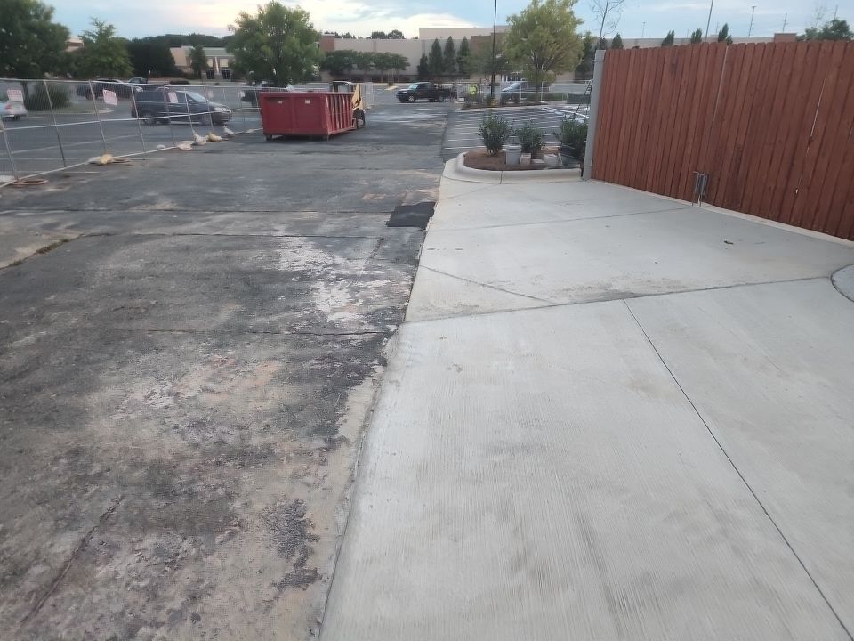 Driveway Clean using cleaner by Power Wash Masters LLC