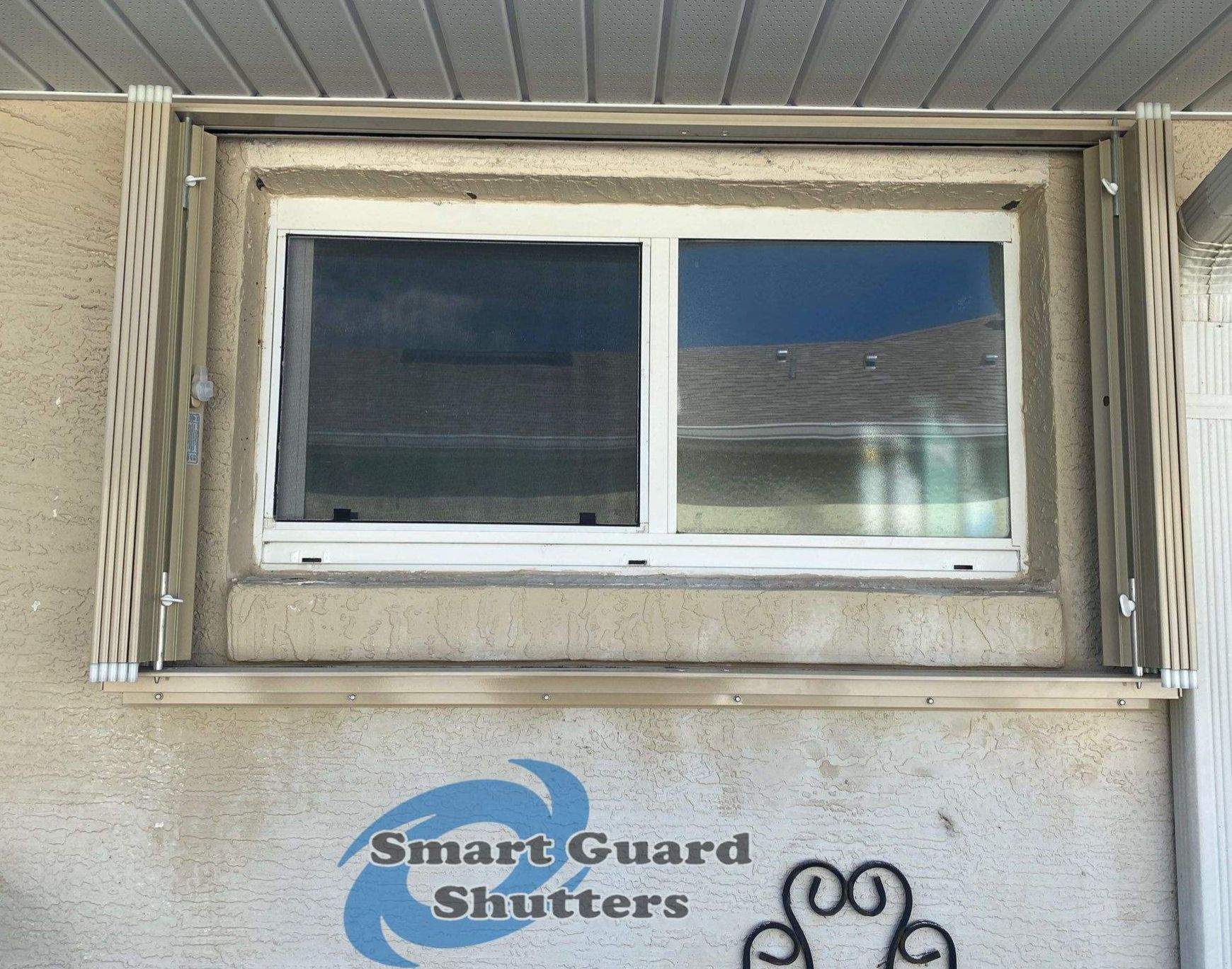 Accordion Shutters in Beige by Smart Guard Shutters