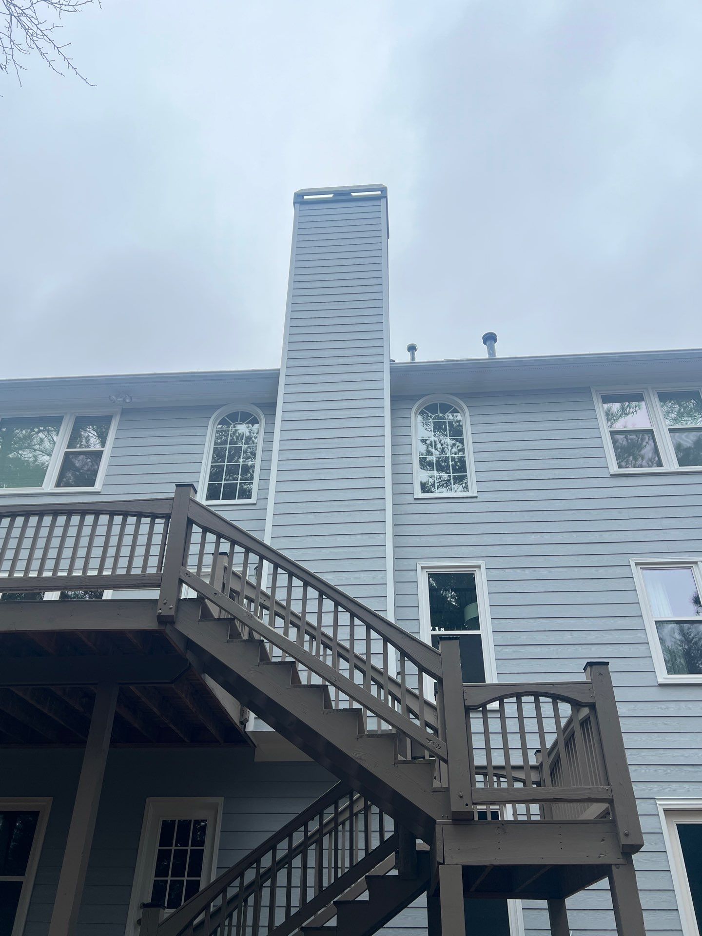 Chimney Siding Reconstruction and Full Exterior Painting in Marietta by Swift Home Renovations